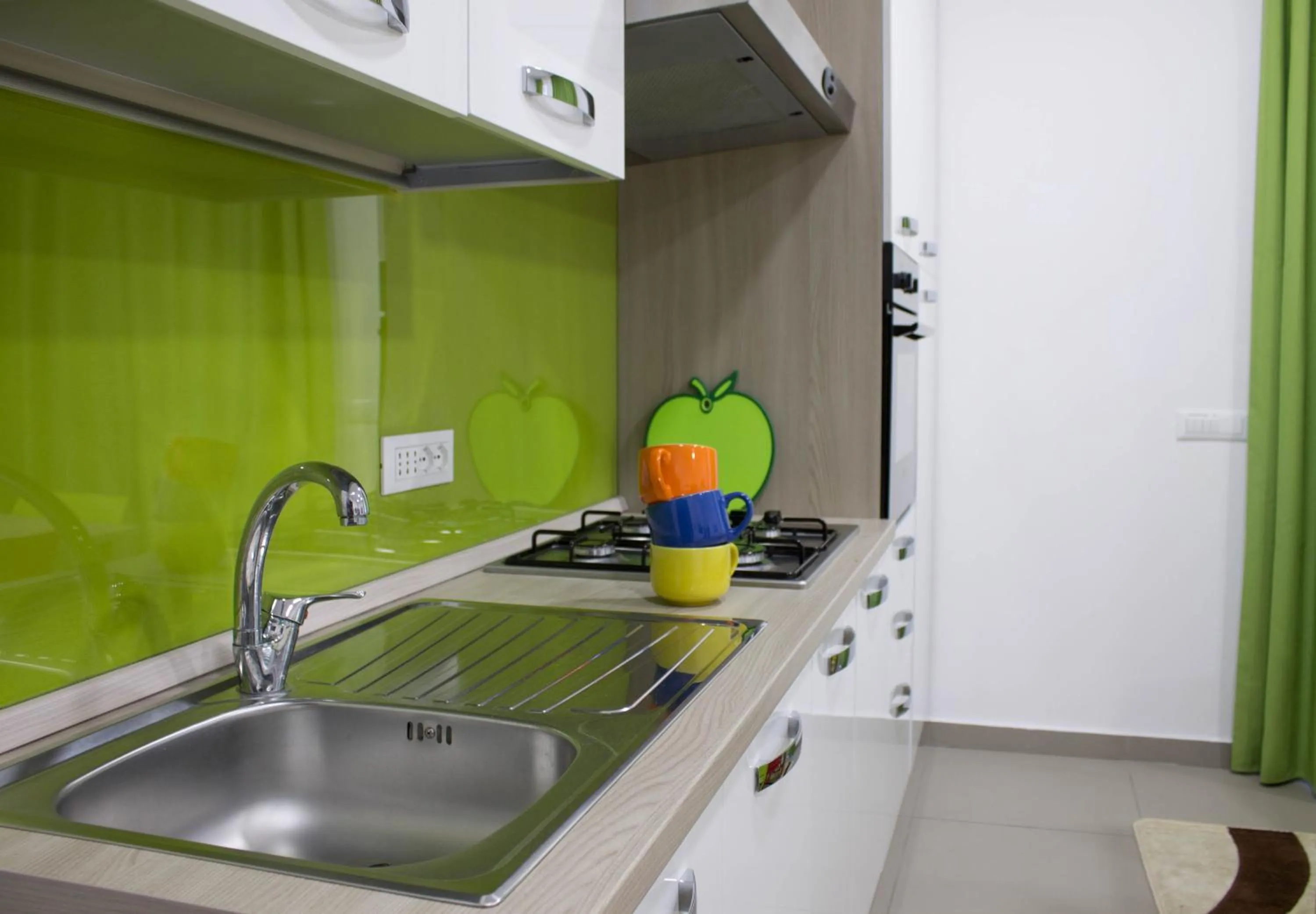 Kitchen or kitchenette in Residence Palazzo dei Delfini by RECEPTIO