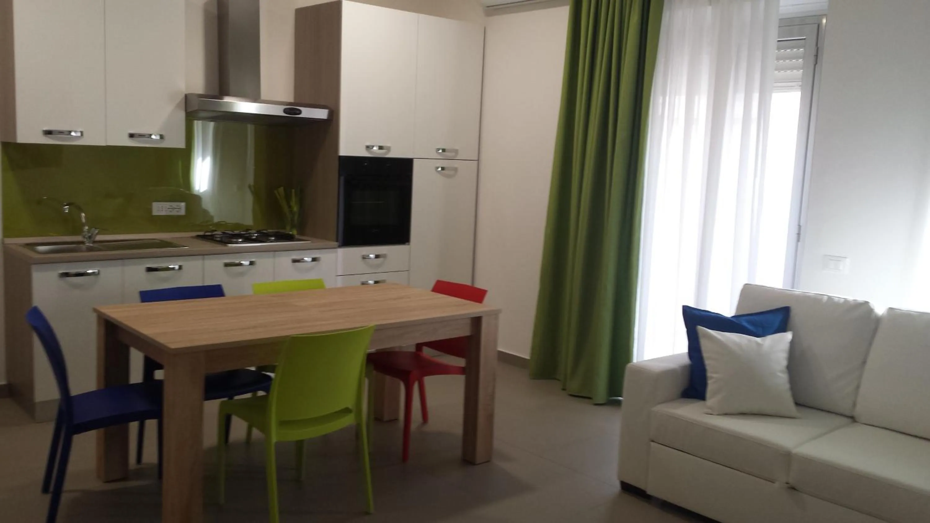 Kitchen or kitchenette in Residence Palazzo dei Delfini by RECEPTIO