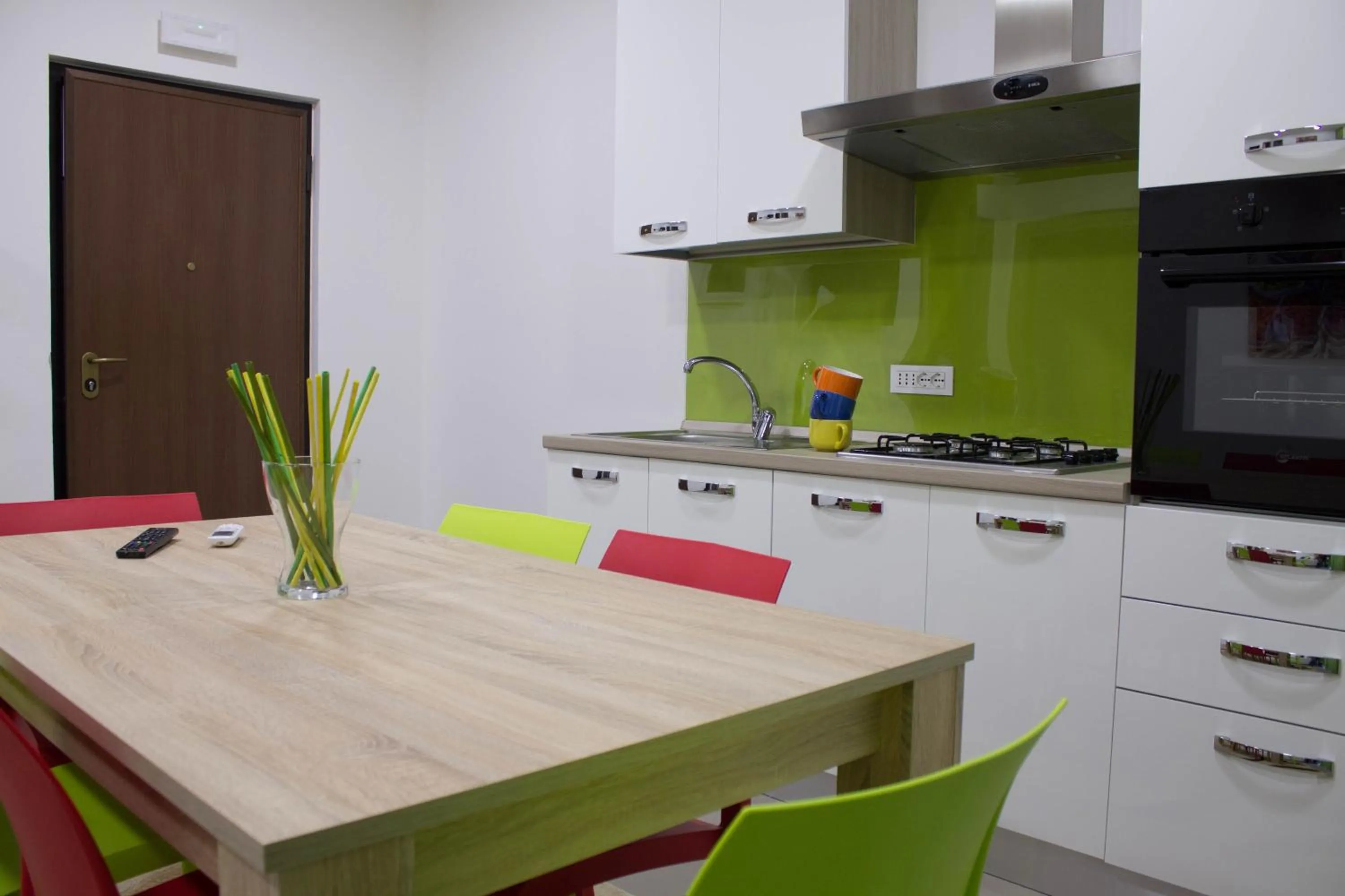 Kitchen or kitchenette in Residence Palazzo dei Delfini by RECEPTIO