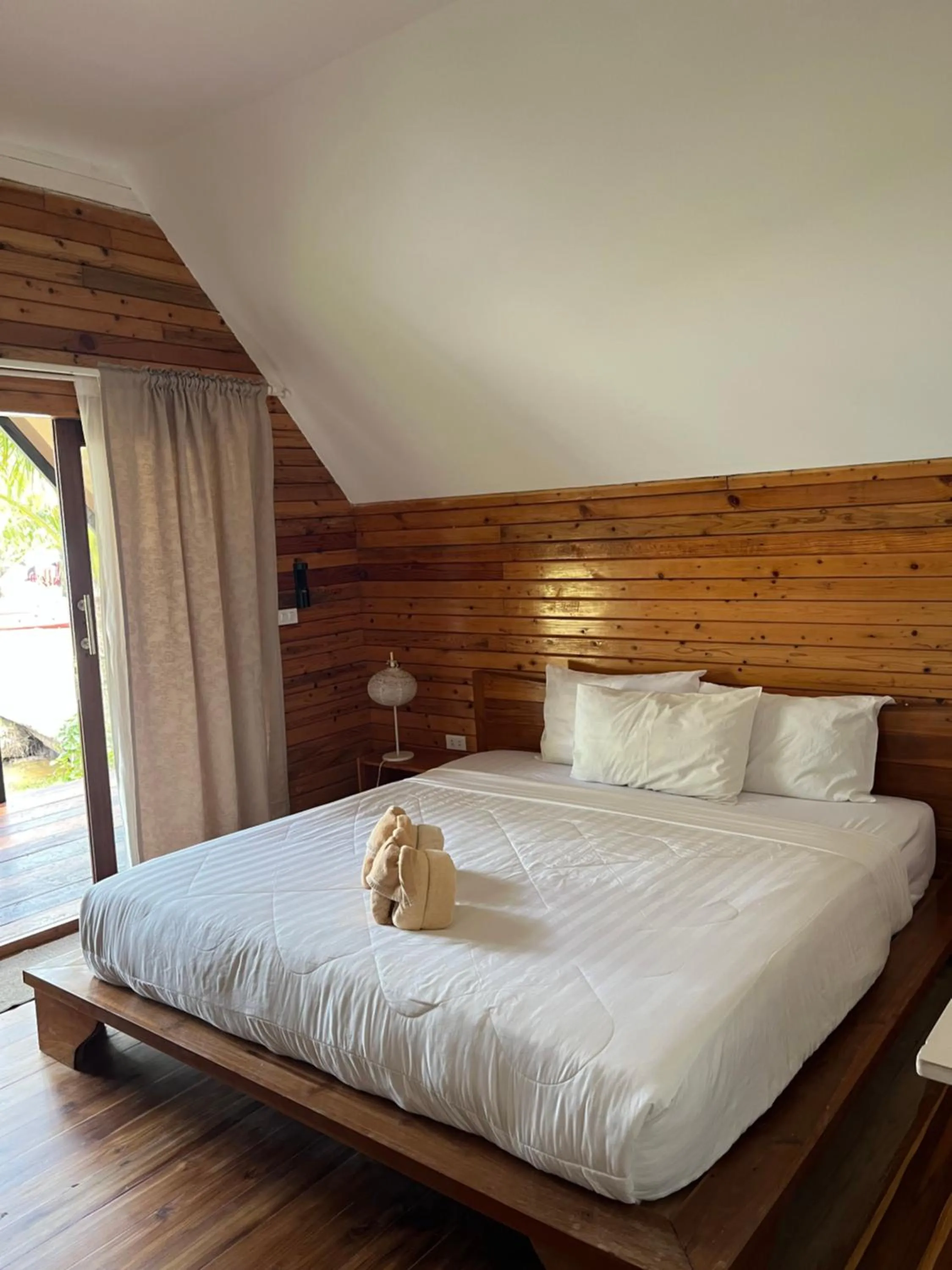 Bed in A-Na-Lay Resort Koh Kood