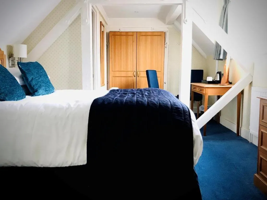 Bed in The Birch Hotel