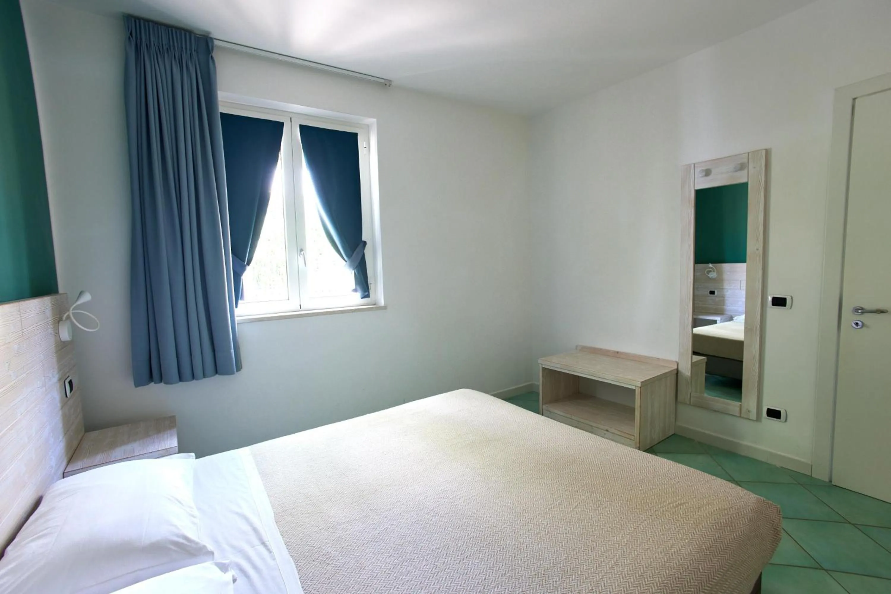 Photo of the whole room, Bed in Ancora Resort