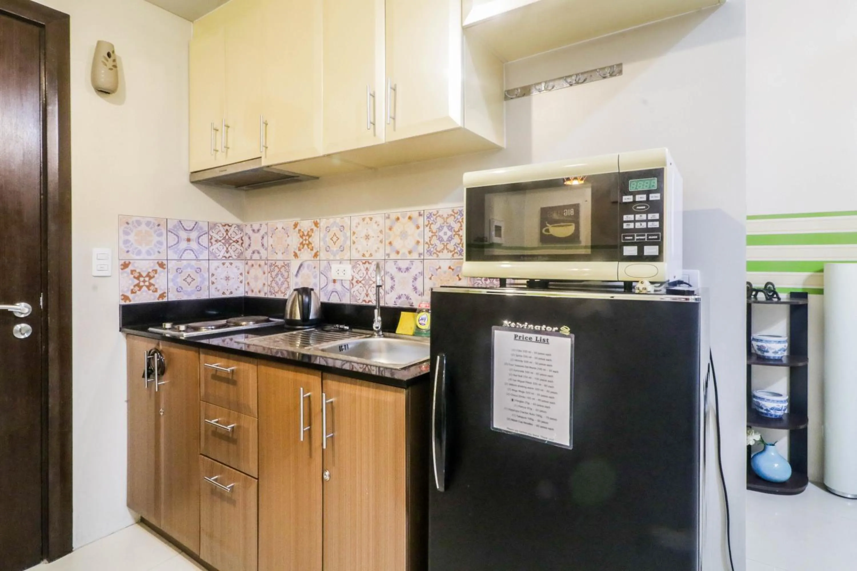 Kitchen or kitchenette in PRS at One Palm Tree Villa near T3 Airport