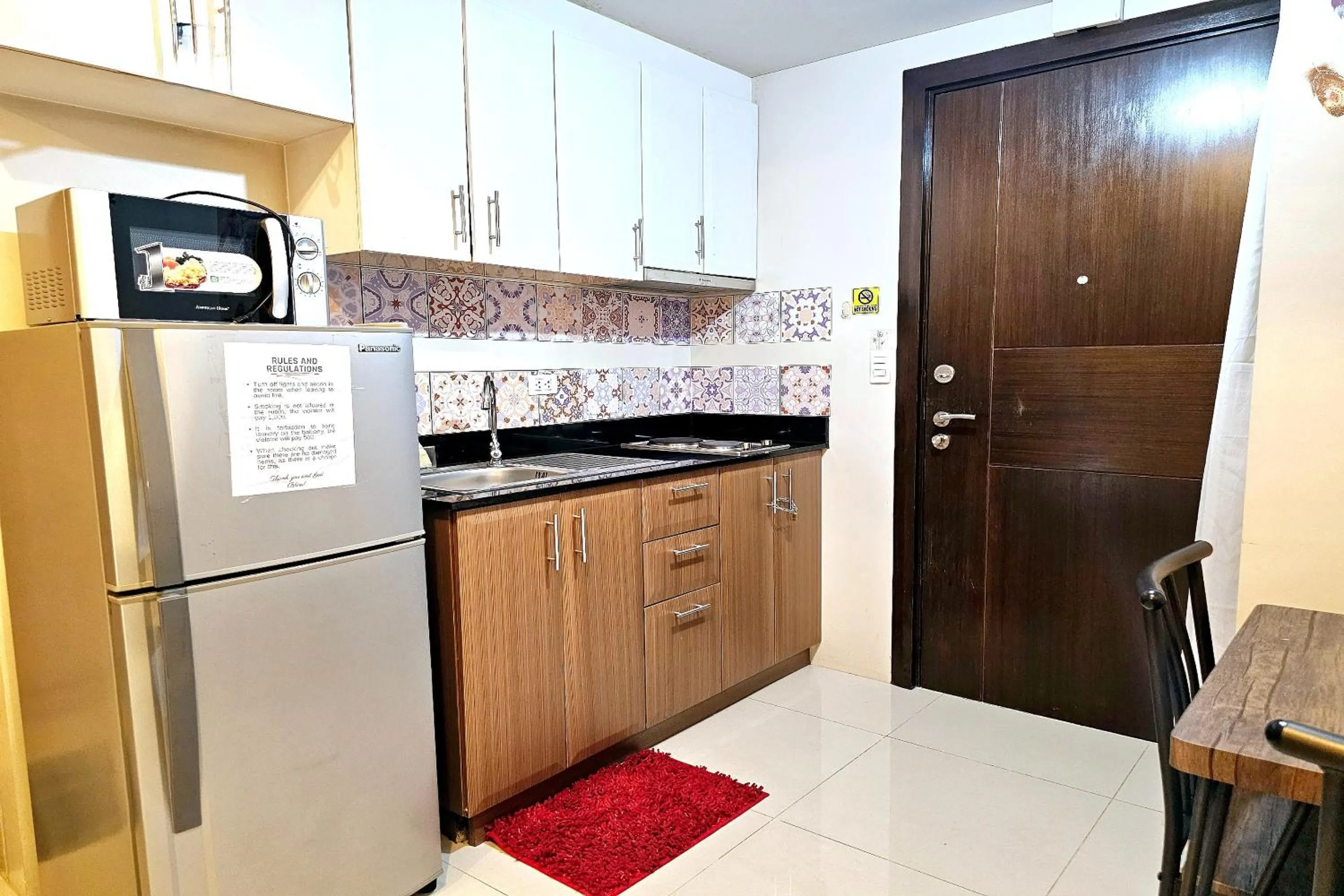 Kitchen or kitchenette in PRS at One Palm Tree Villa near T3 Airport