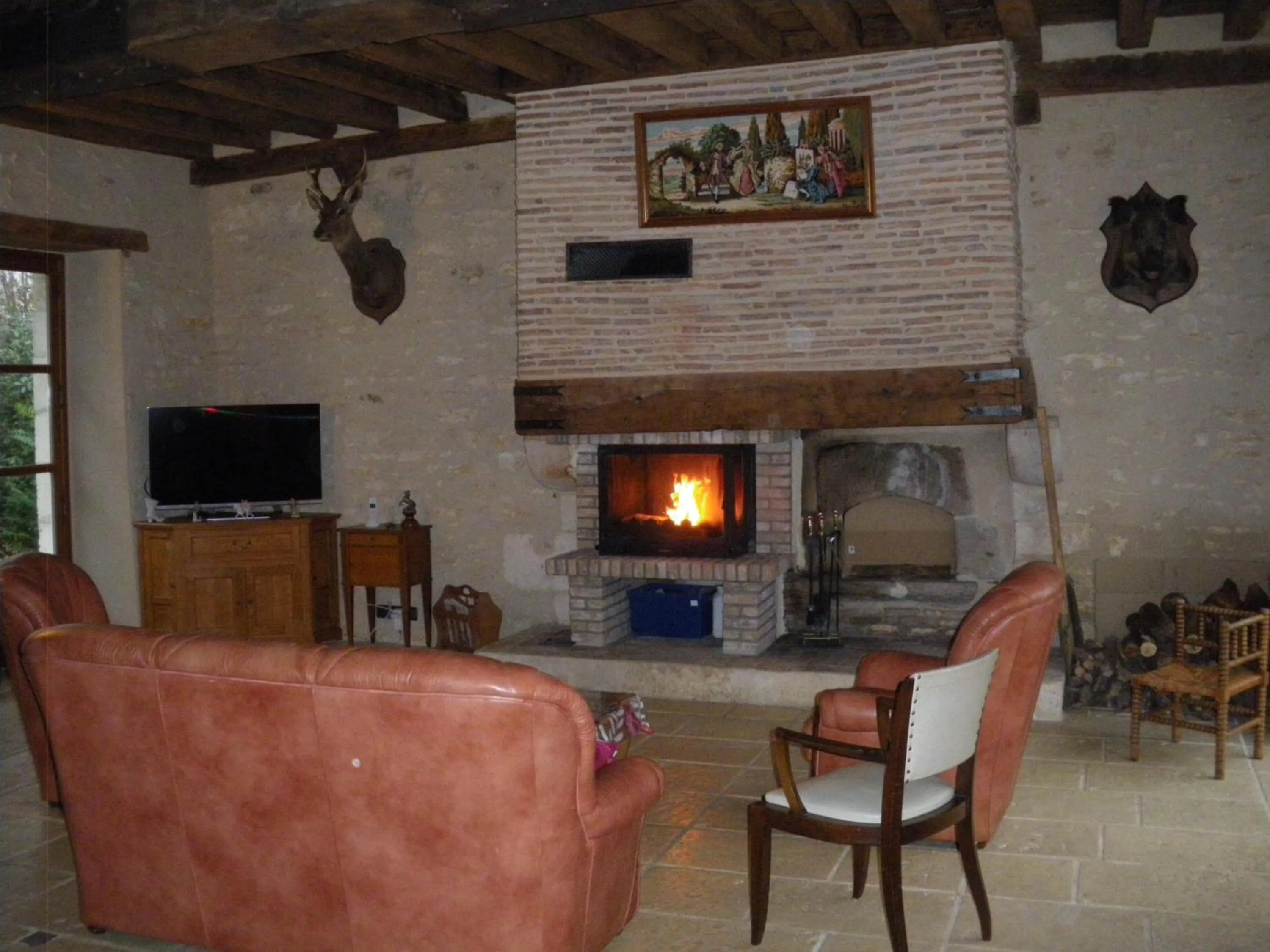 Communal lounge/ TV room in Domaine de la Touche Mosnay