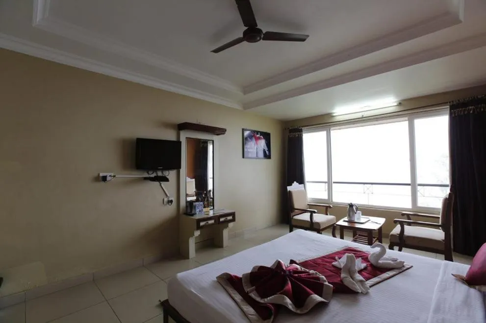 Bed in KSTDC Hotel Mayura Valley View Madikeri