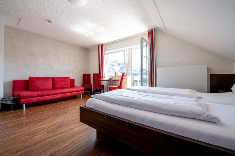 Bed in Garni Hotel Henn