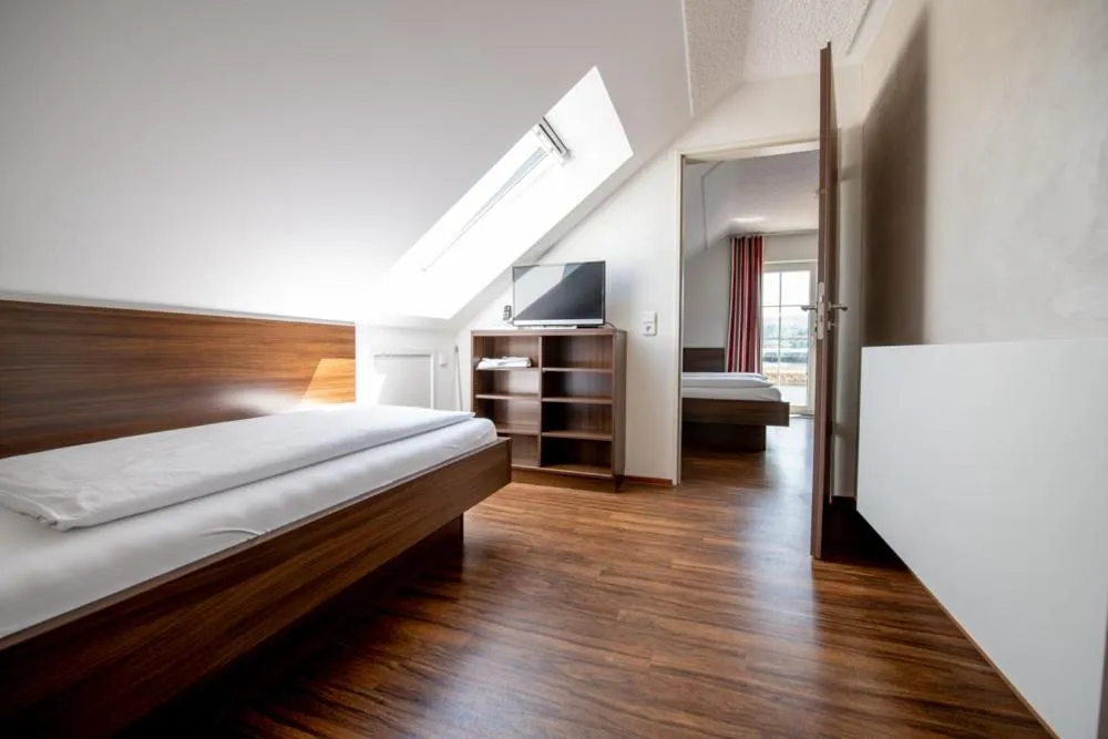 Bed in Garni Hotel Henn