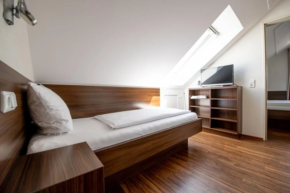 Bed in Garni Hotel Henn