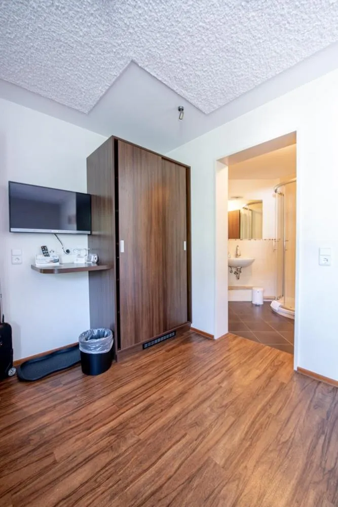 Bed in Garni Hotel Henn