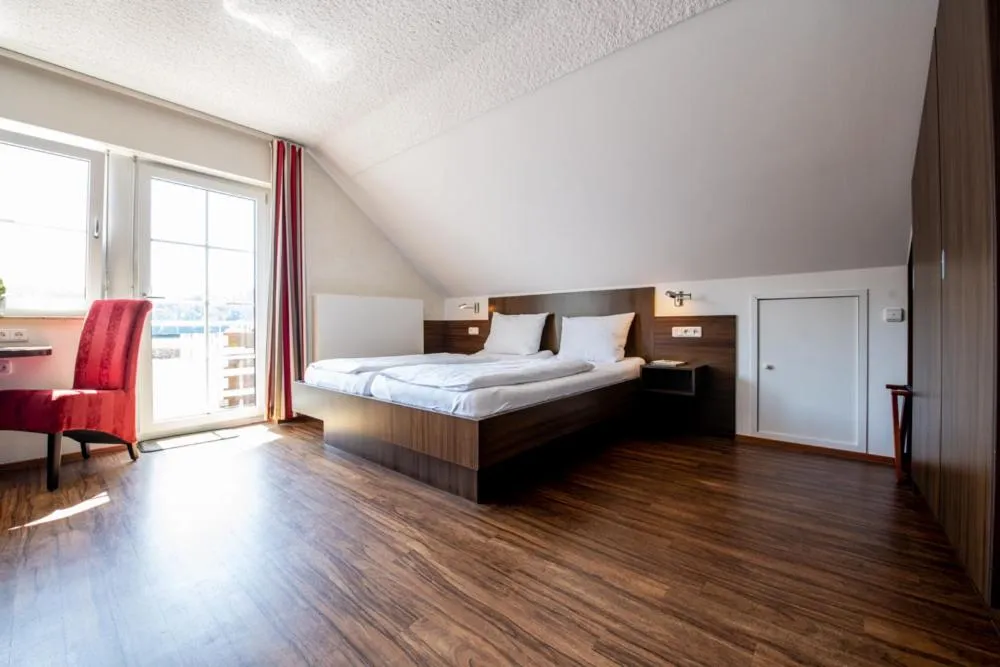 Bed in Garni Hotel Henn