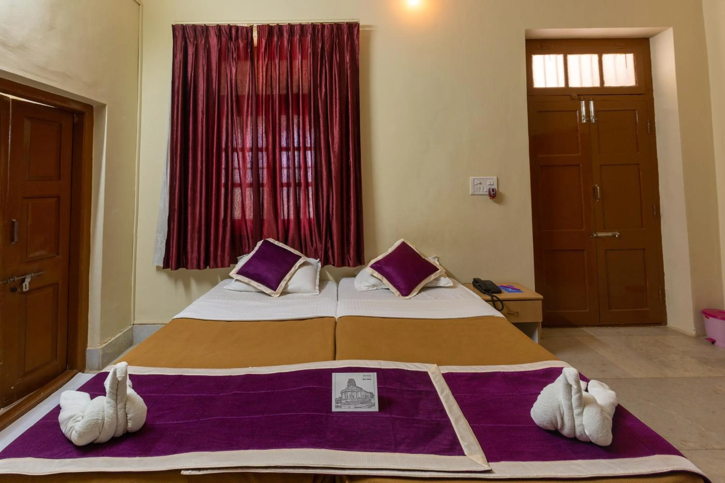 Bed in KSTDC Hotel Mayura Chalukya, Badami
