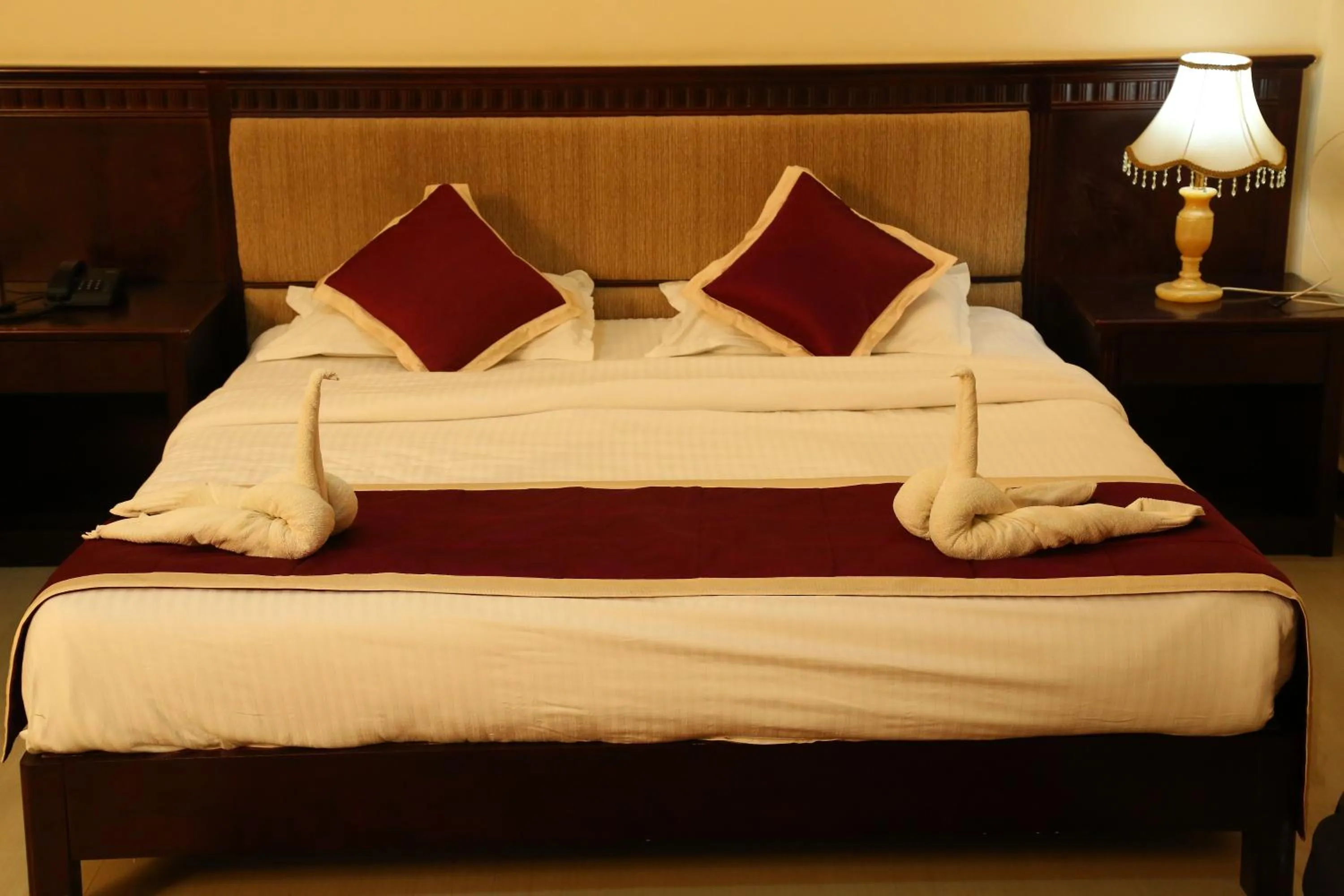 Bed in KSTDC Hotel Mayura Chalukya, Badami