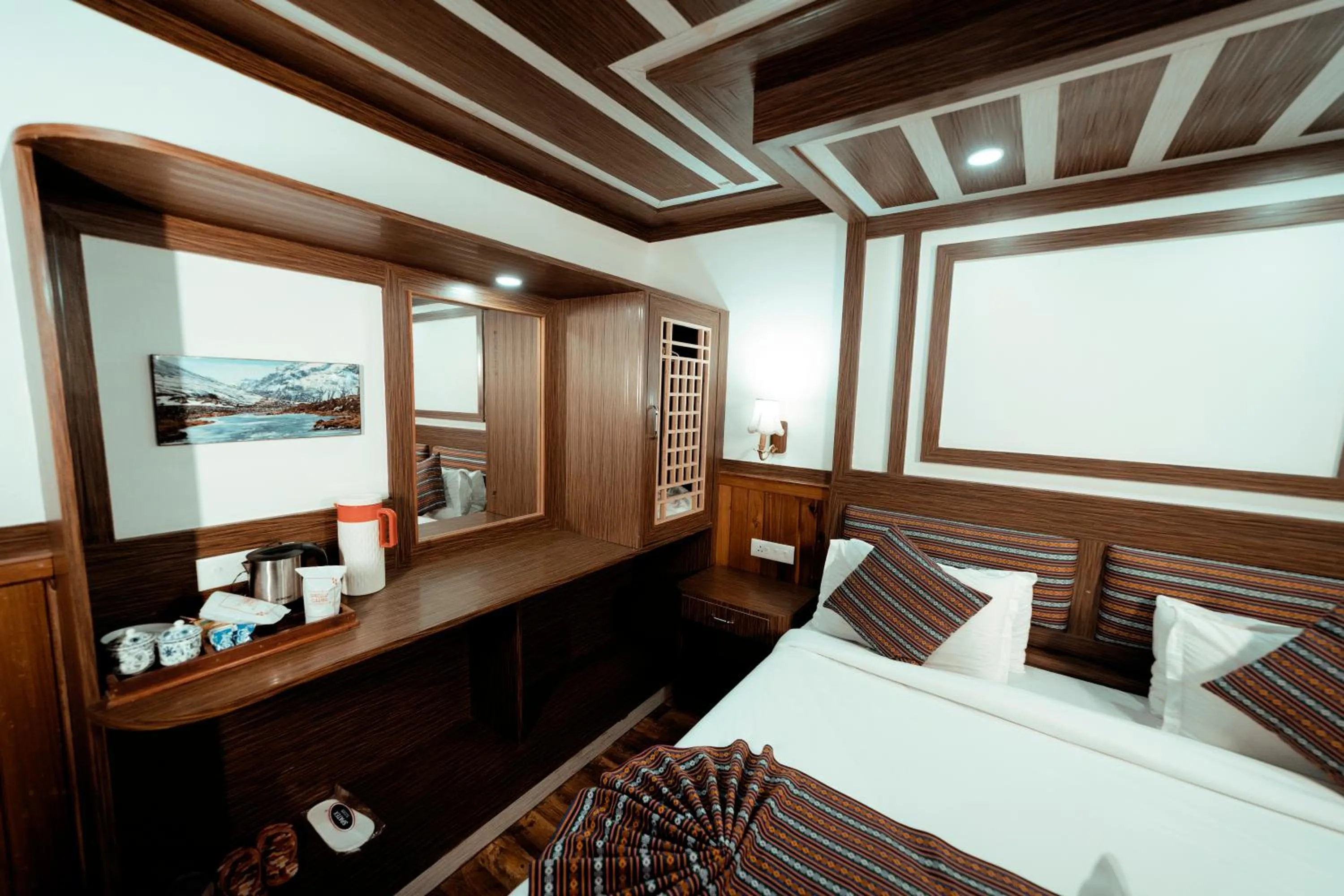 Bed in Yangthang Dzimkha Resort