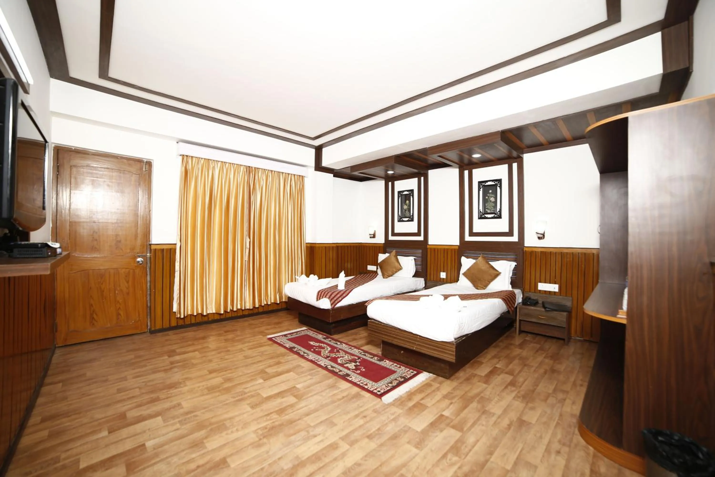 Bed in Yangthang Dzimkha Resort