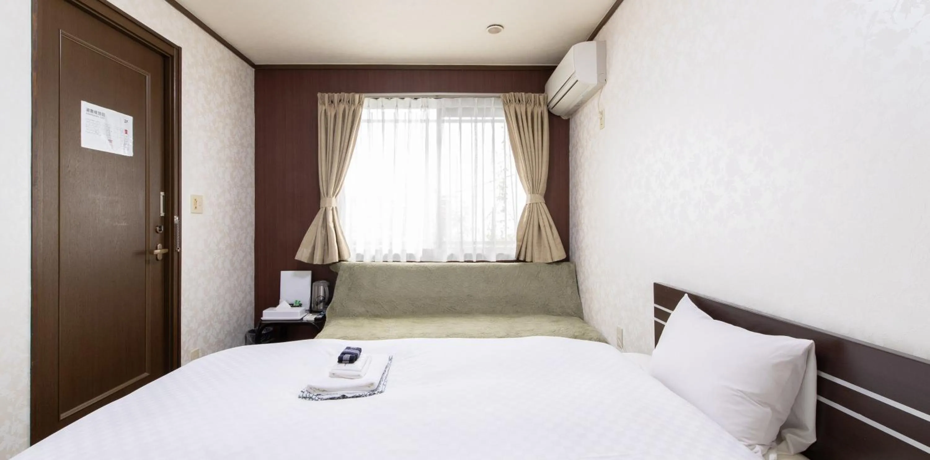 Photo of the whole room, Bed in Tabist Yamaga Onsen Yuyado Izumi