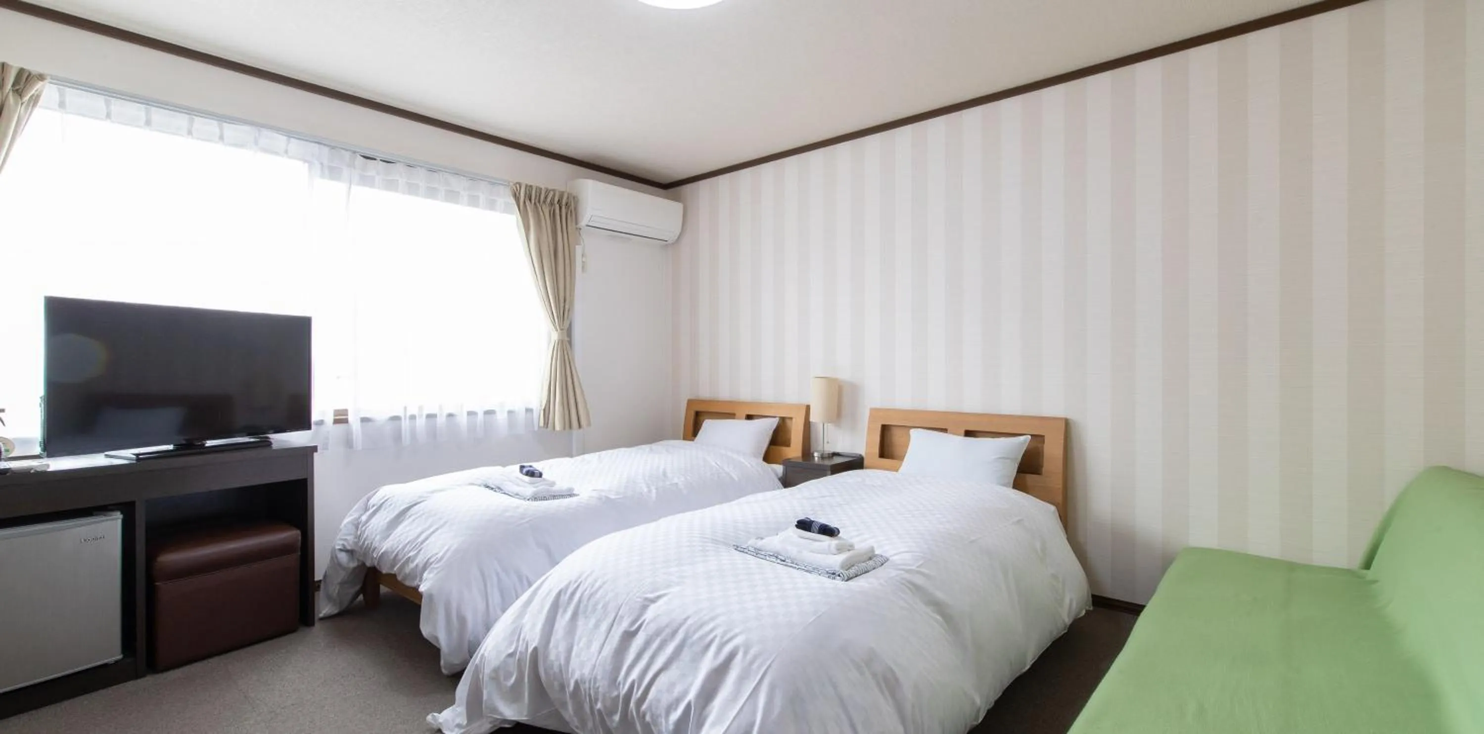 Photo of the whole room, Bed in Tabist Yamaga Onsen Yuyado Izumi