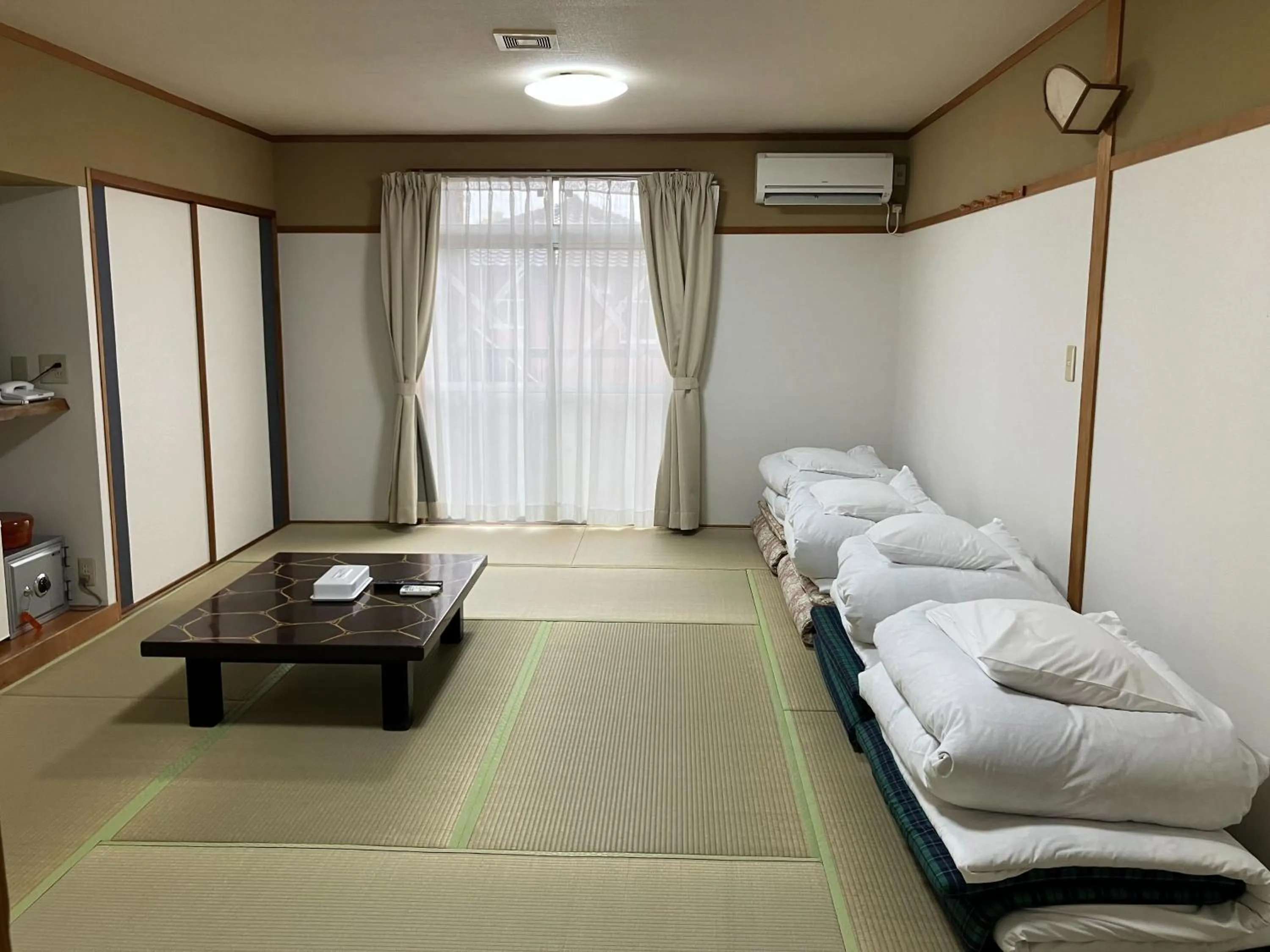 Photo of the whole room, Bed in Tabist Yamaga Onsen Yuyado Izumi