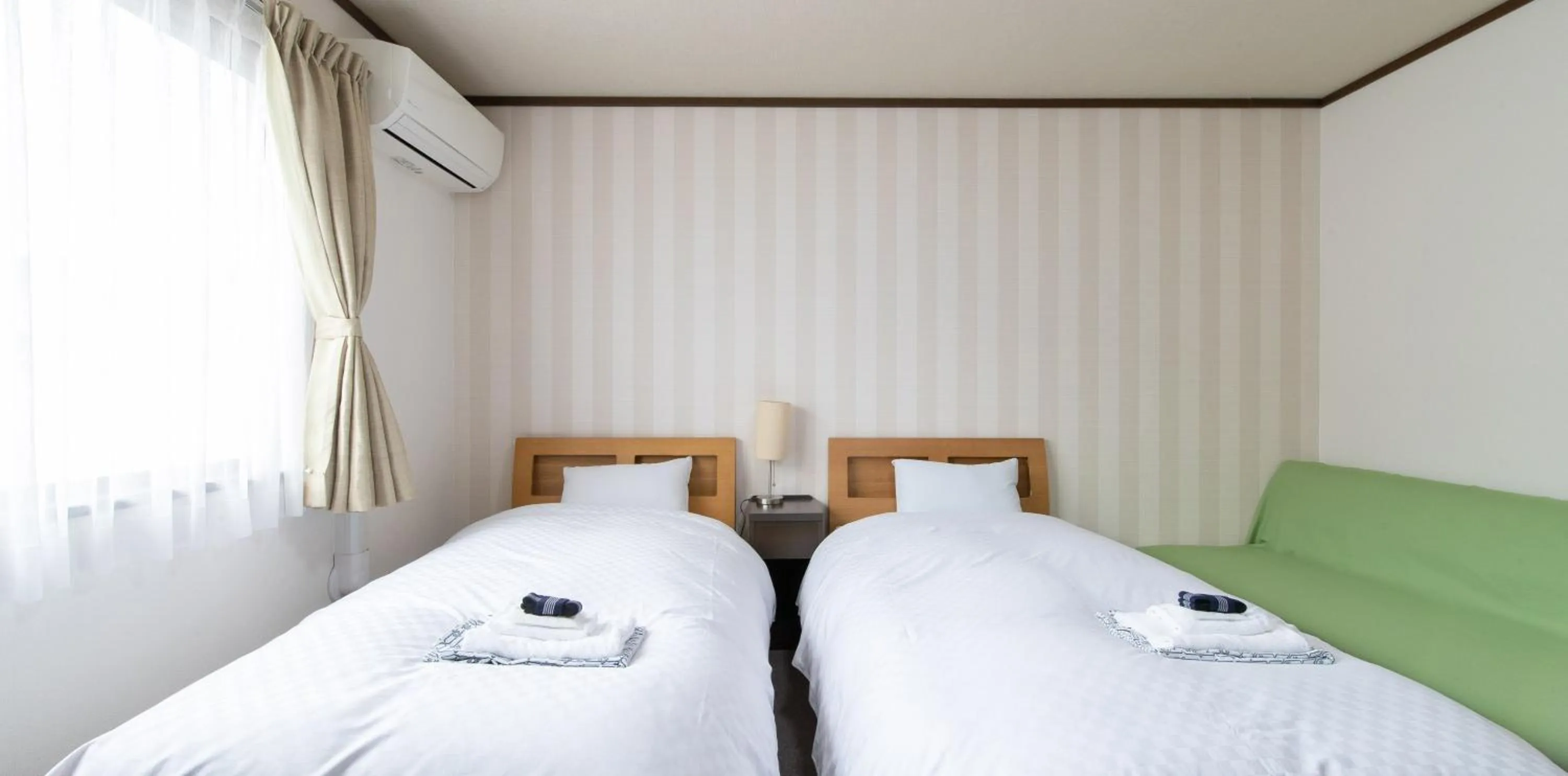 Photo of the whole room, Bed in Tabist Yamaga Onsen Yuyado Izumi