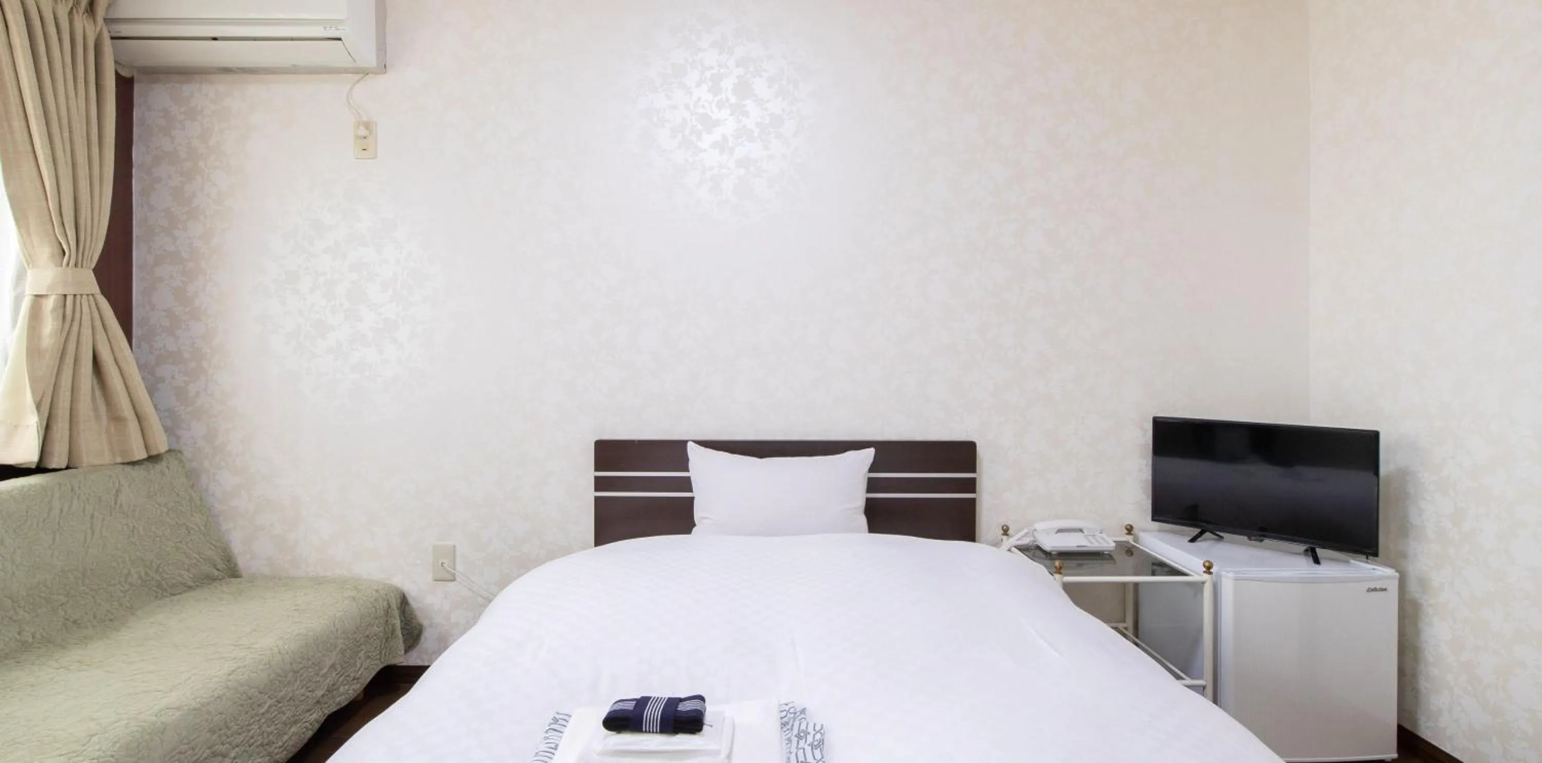 Photo of the whole room, Bed in Tabist Yamaga Onsen Yuyado Izumi