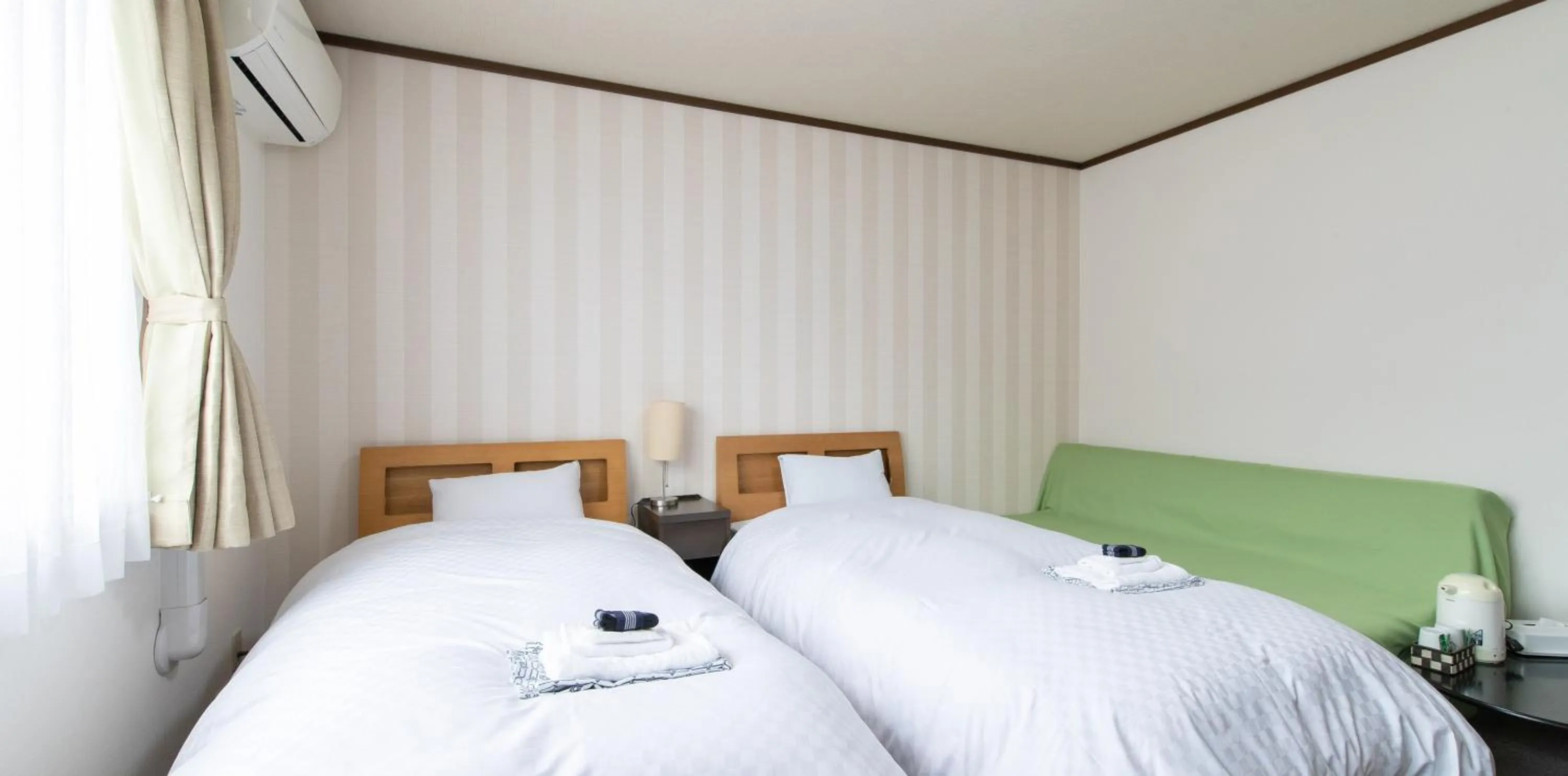 Photo of the whole room, Bed in Tabist Yamaga Onsen Yuyado Izumi