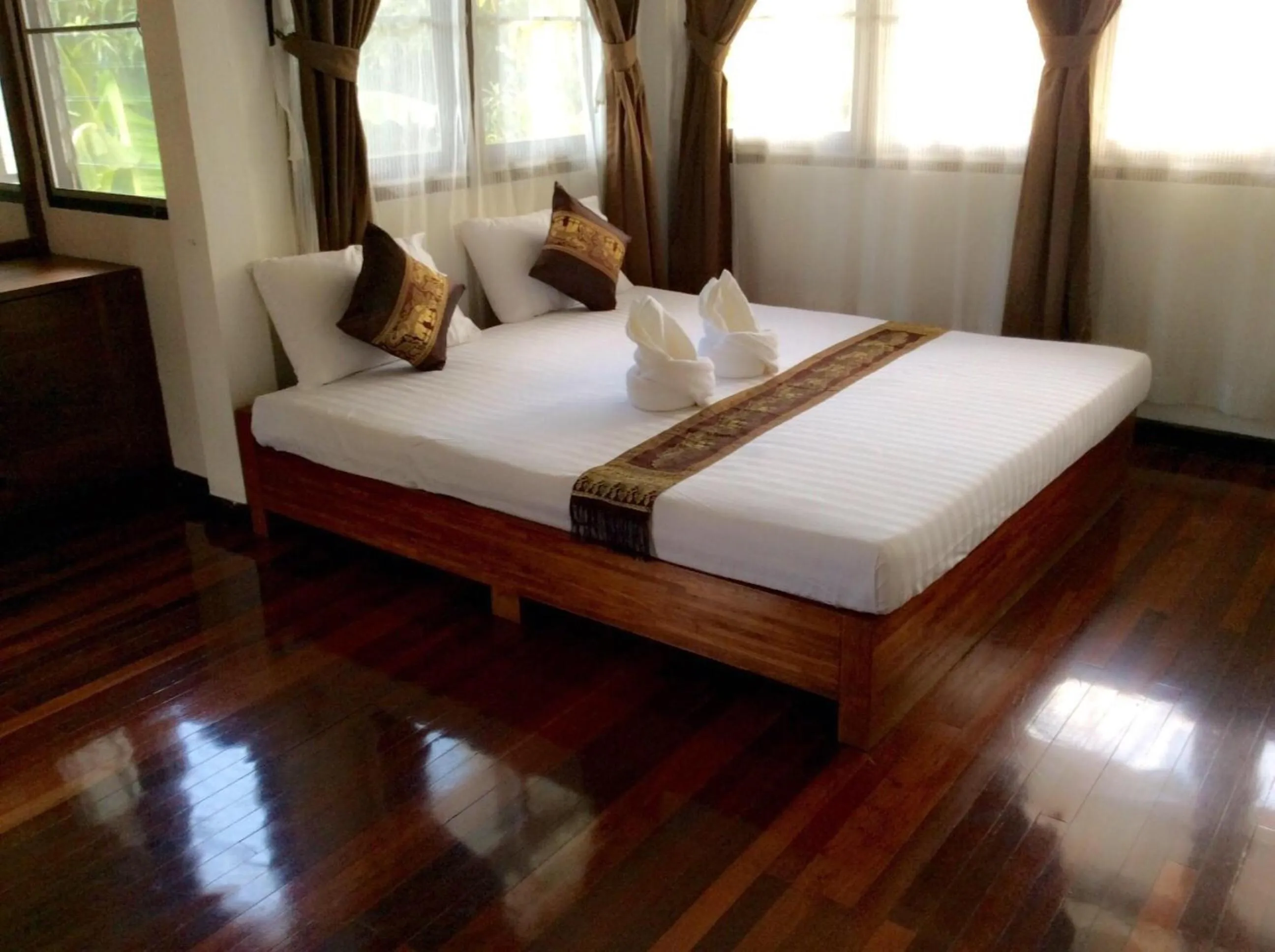 Bed in Naturbliss Resort Village