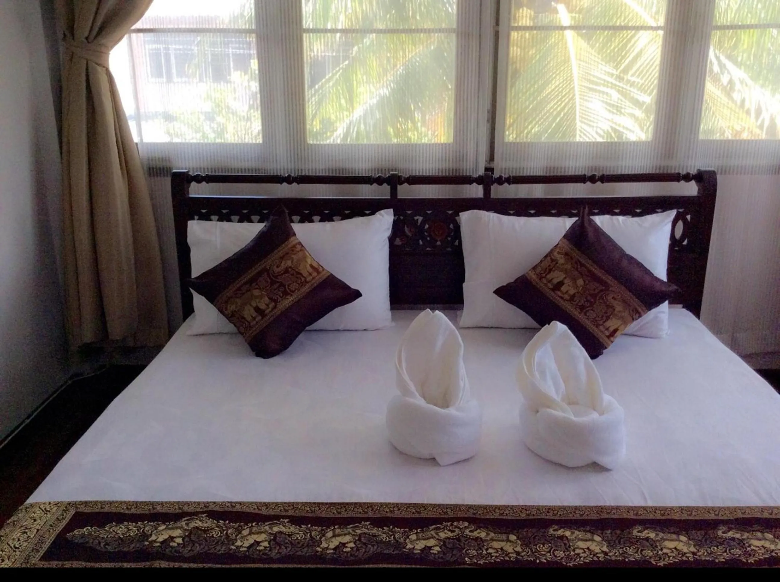 Bed in Naturbliss Resort Village