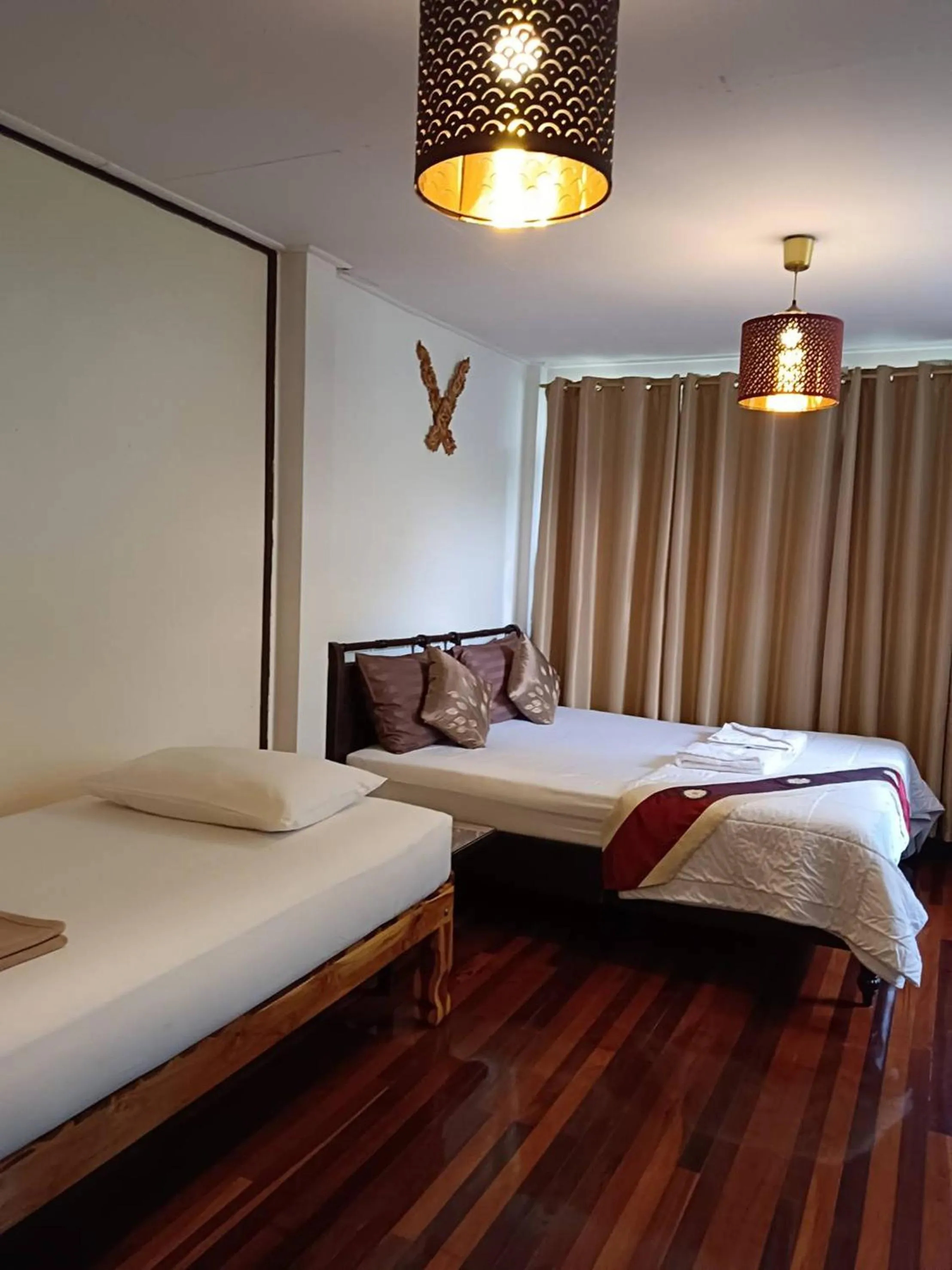 Bed in Naturbliss Resort Village