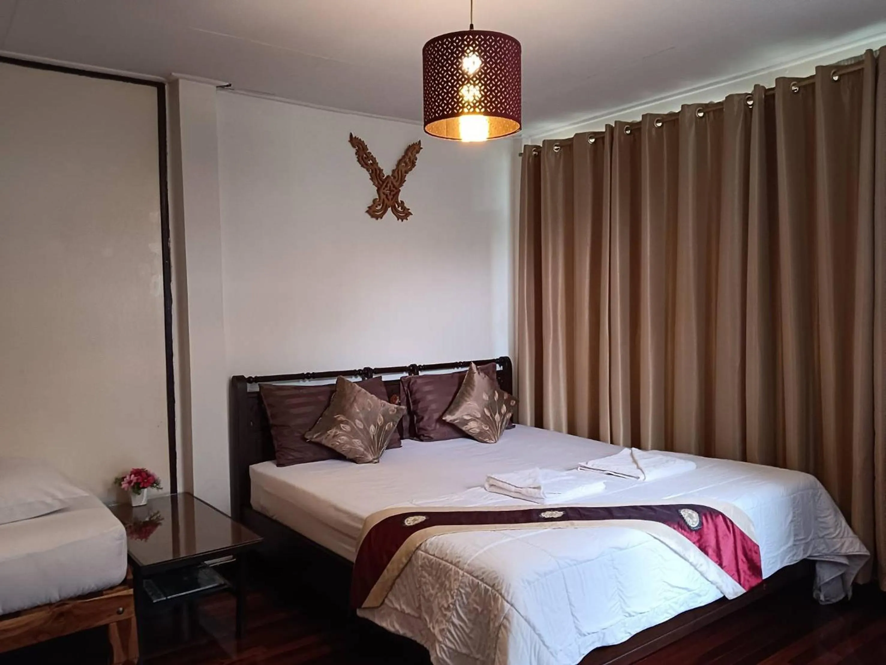 Bed in Naturbliss Resort Village