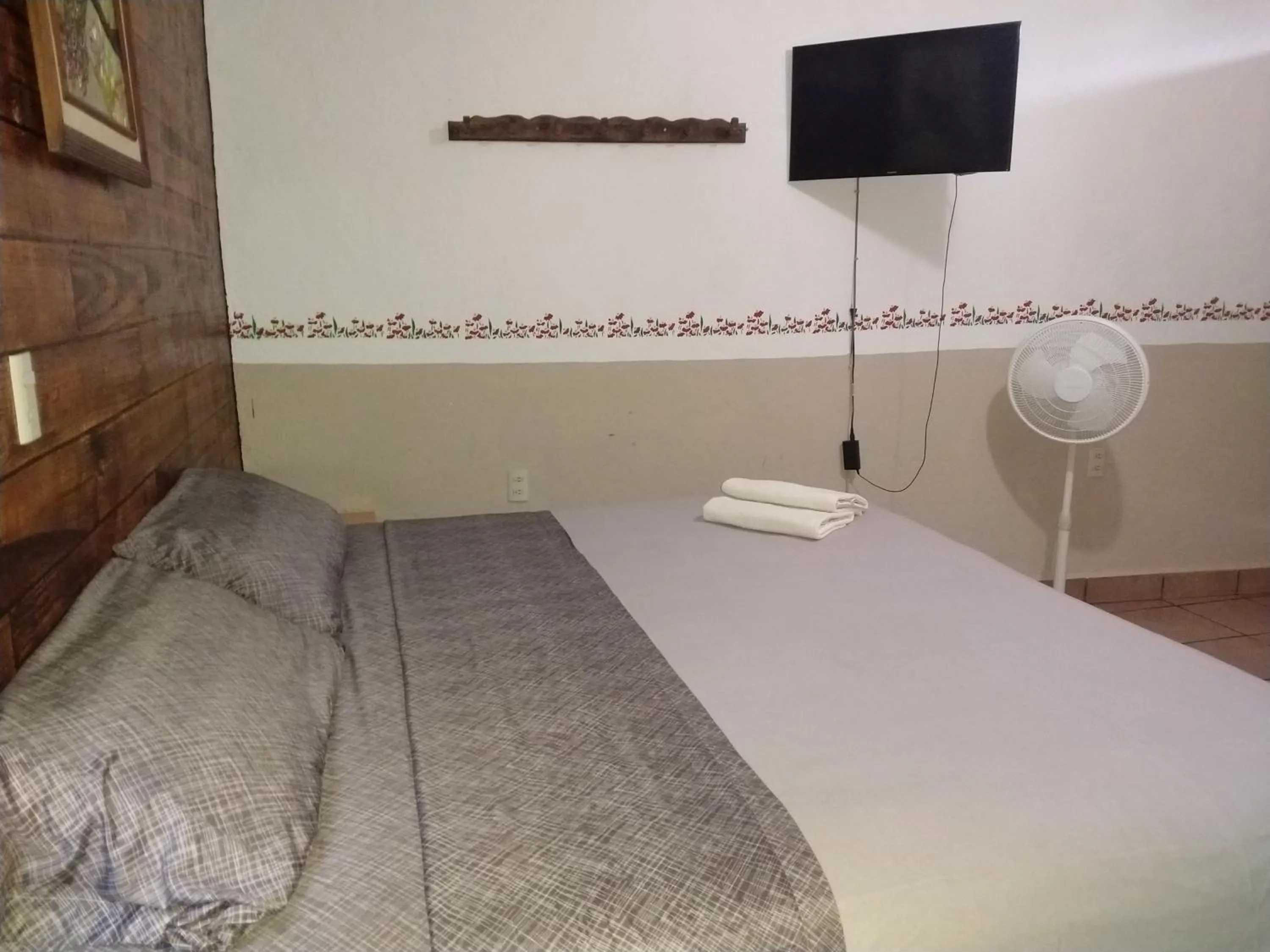 Bed in Hospedaje San Antonio Tepoztlán.