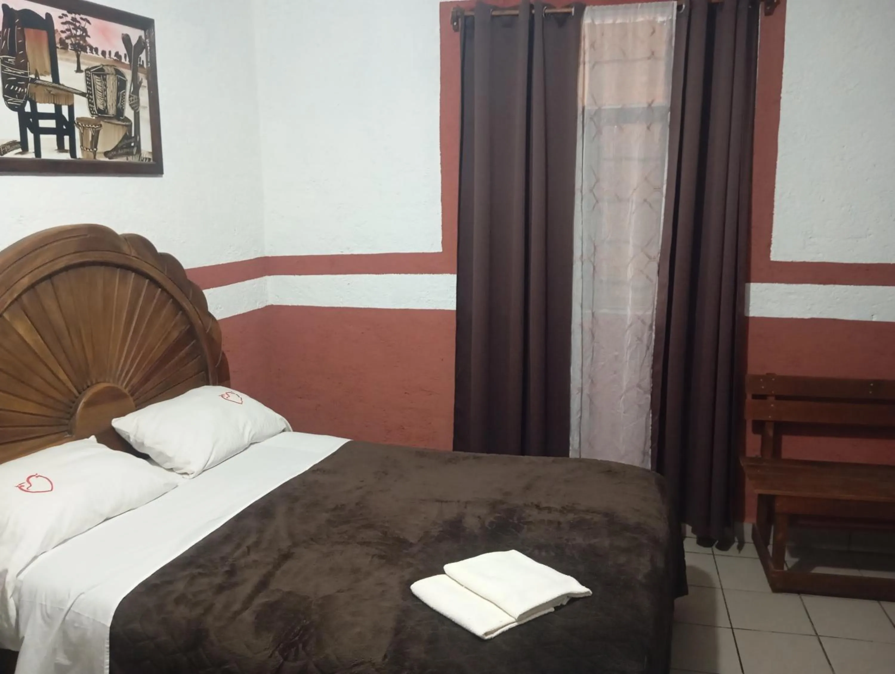 Bed in Hospedaje San Antonio Tepoztlán.