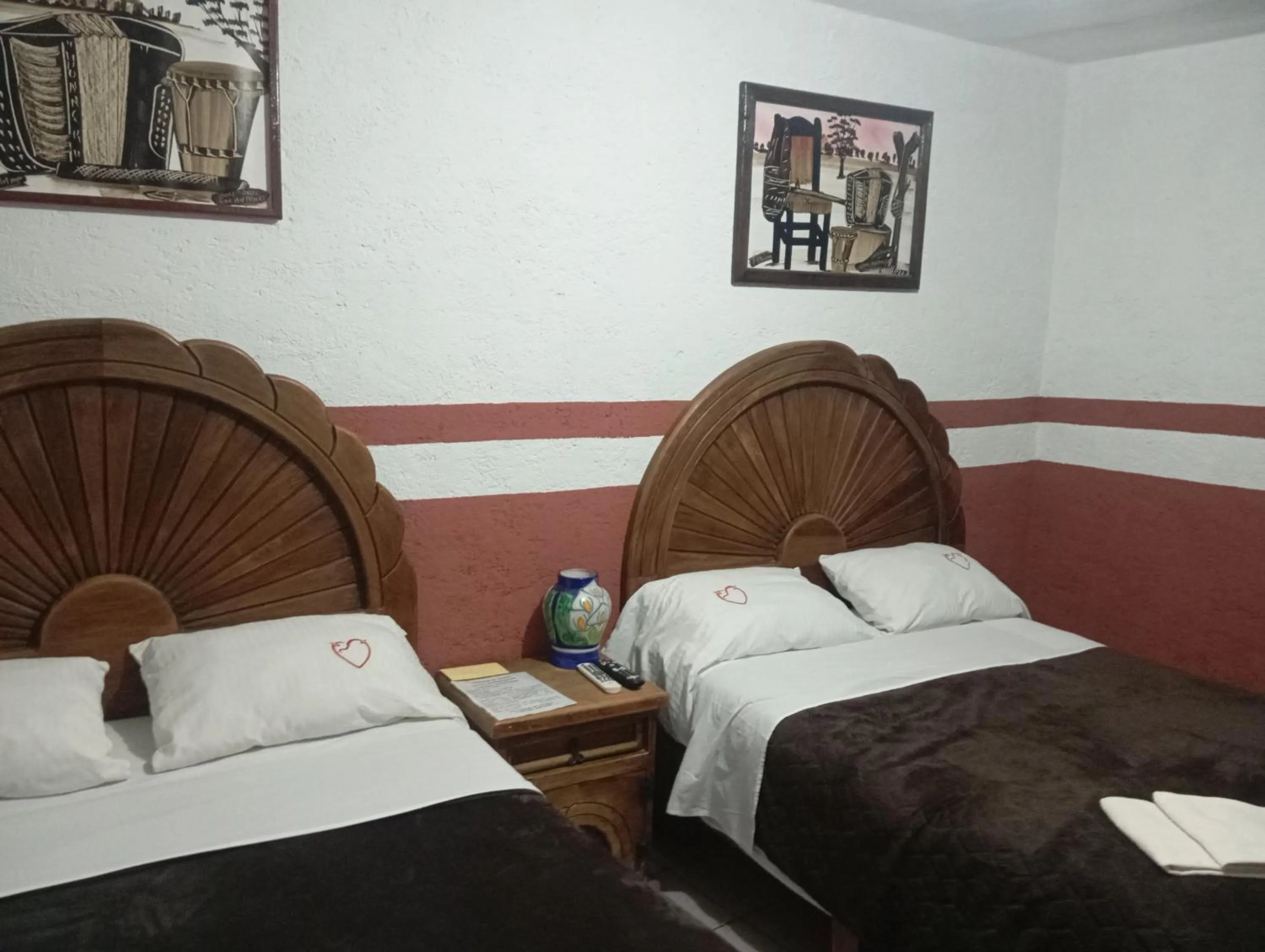 Bed in Hospedaje San Antonio Tepoztlán.