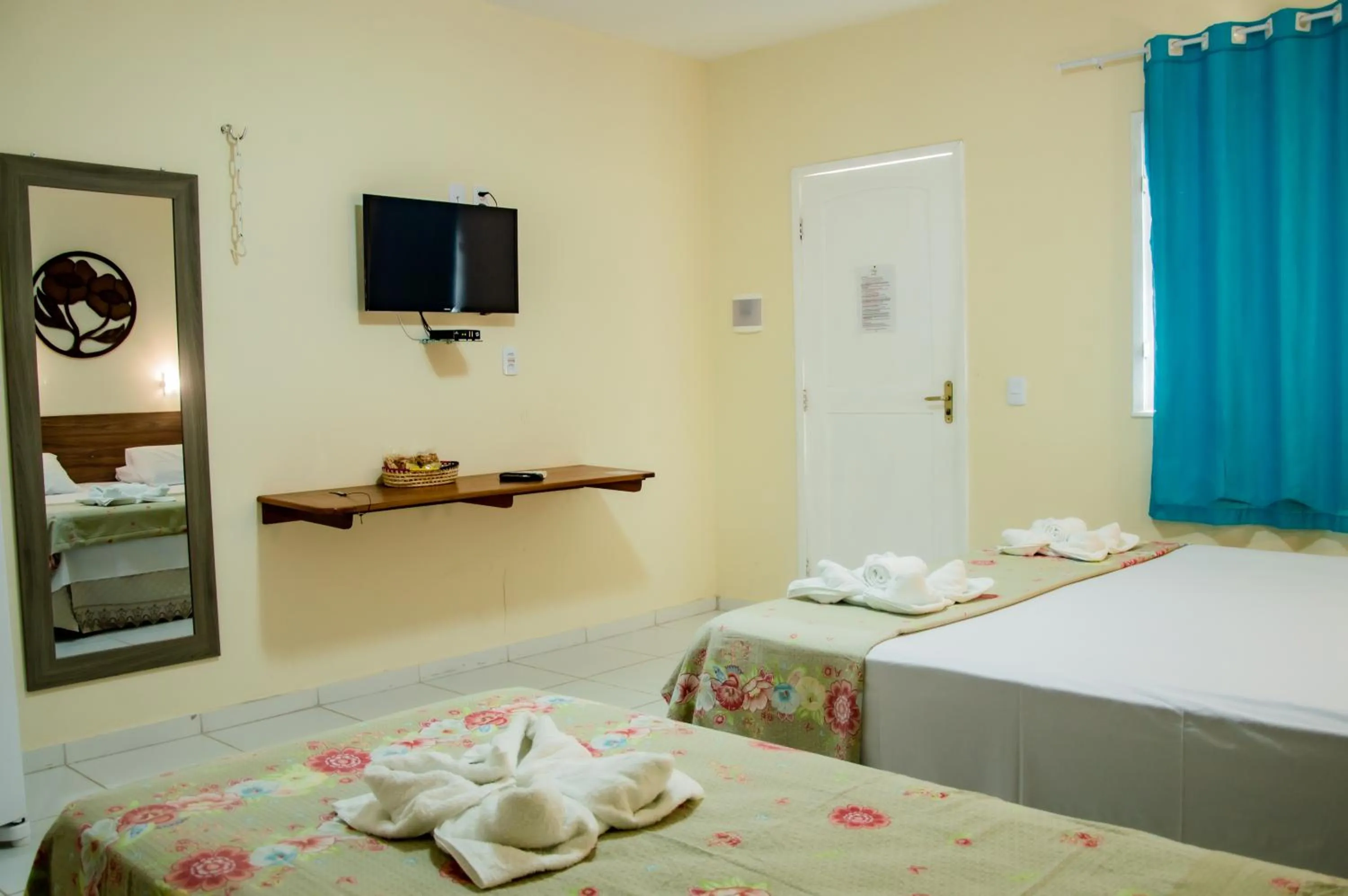 Bed in Pousada Angelica