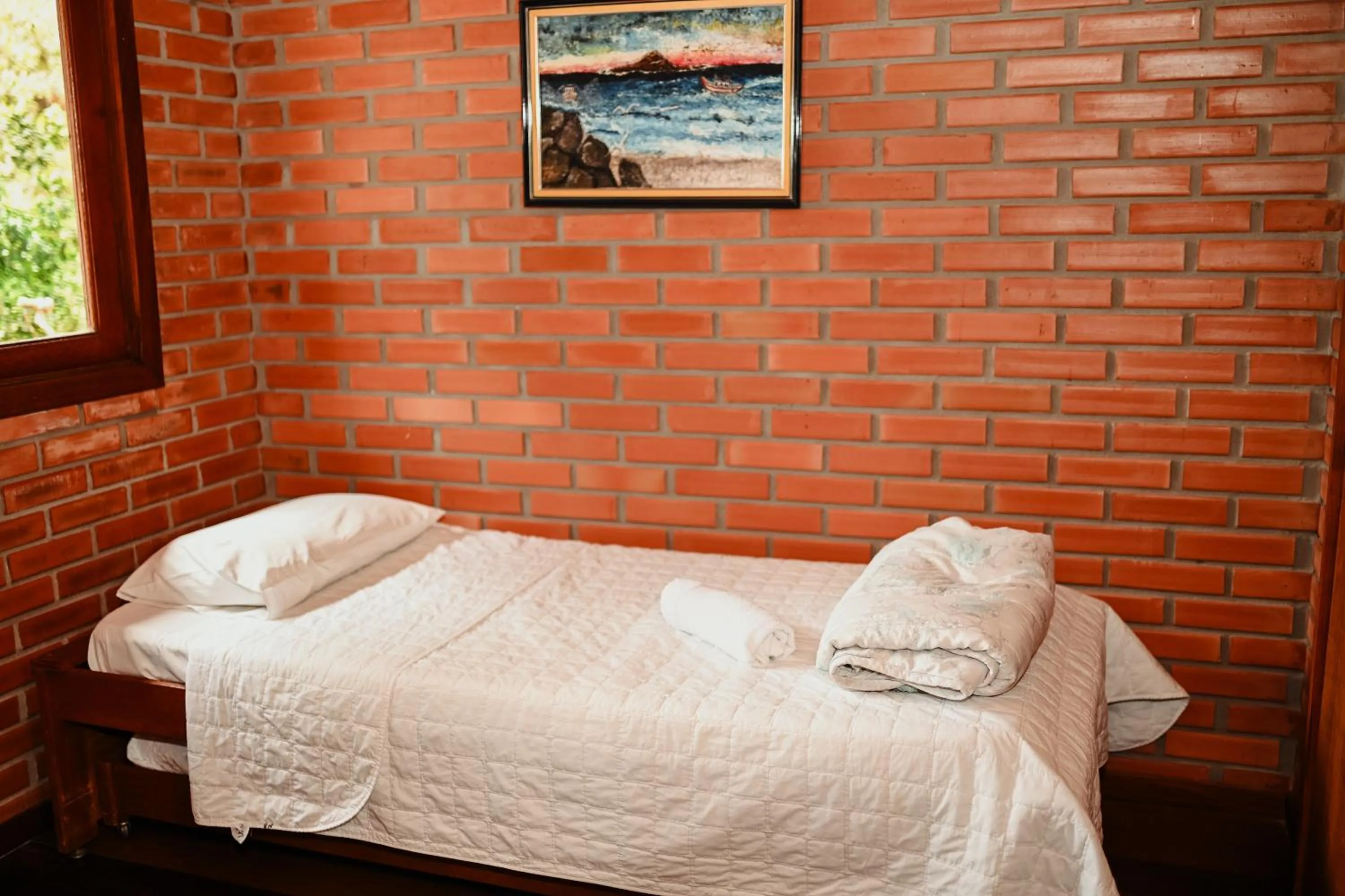 Bed in Pousada Nosso Bosque