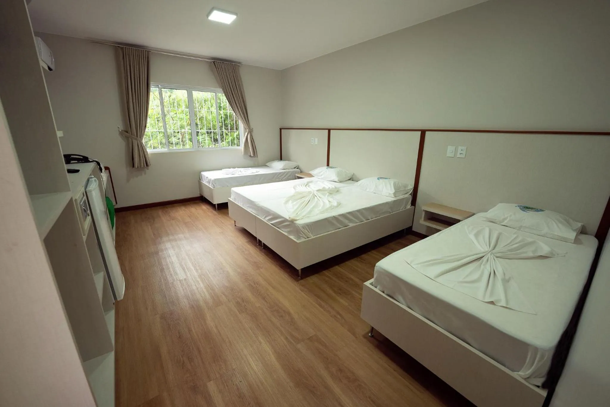 Bed in Ody Park Resort Hotel