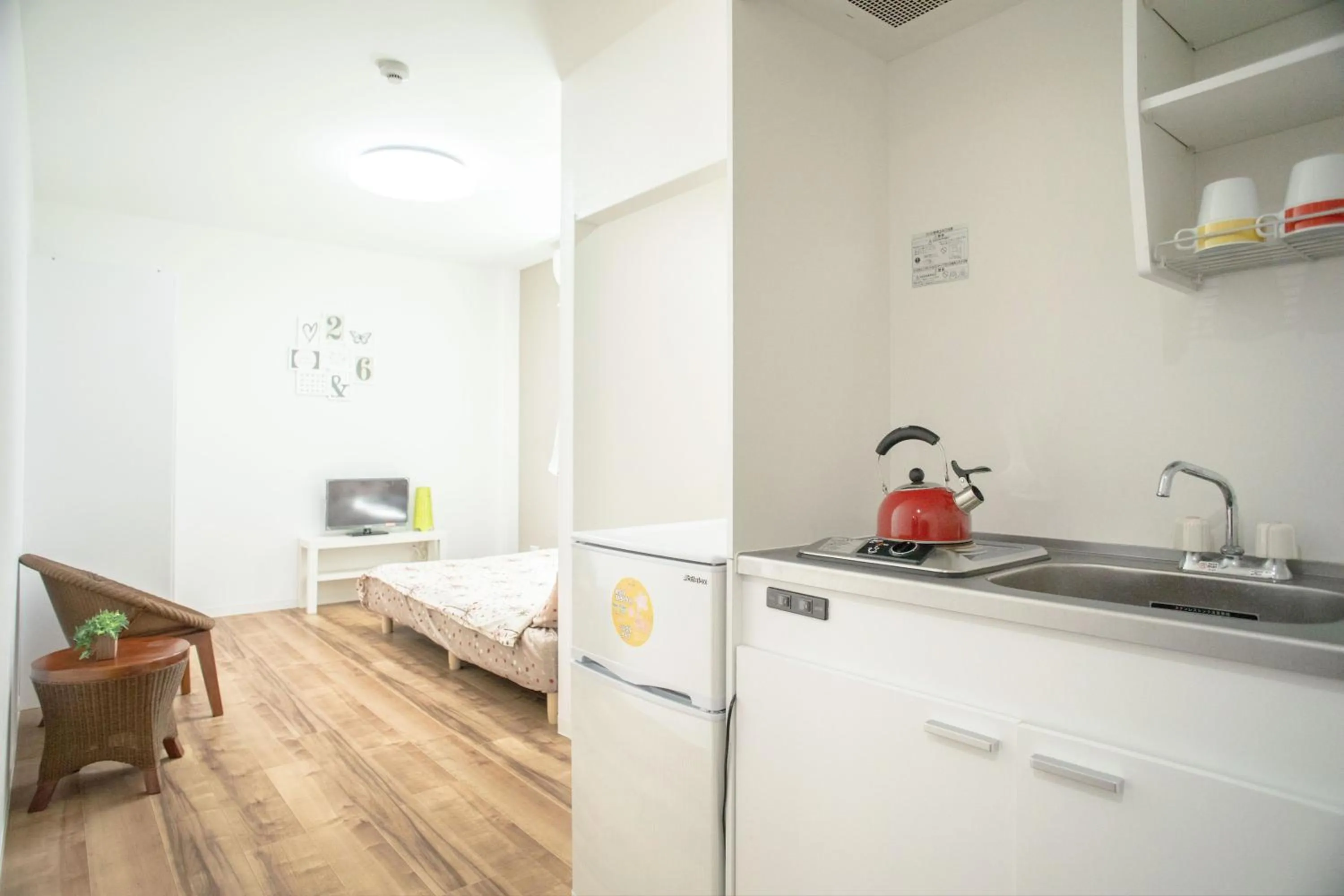 Kitchen or kitchenette, Bed in Osaka Tsuruhashitei Hotel Asahi group 大阪鶴橋亭ホテル