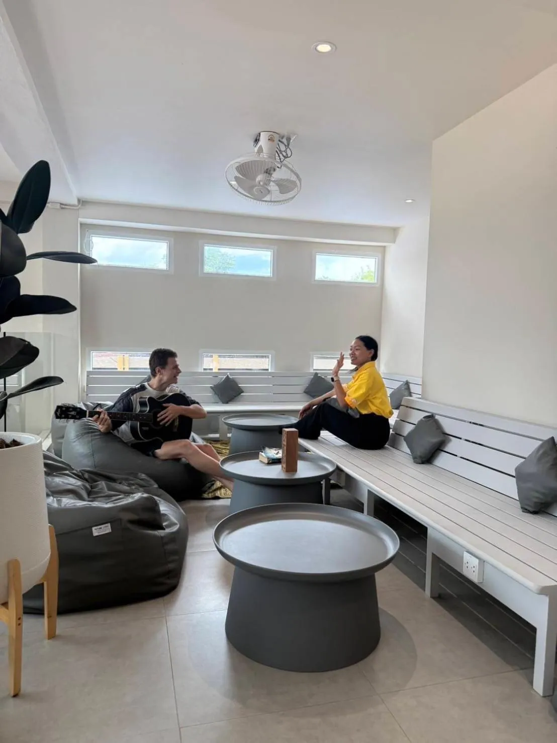 Communal lounge/ TV room in P168 Hostel Samui