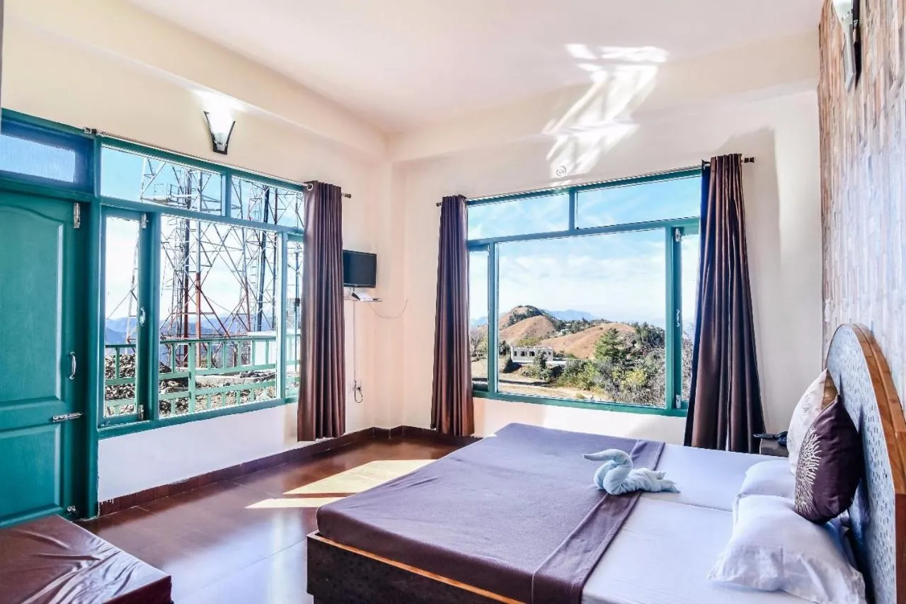 Bed in Trimurti Pine Valley Resort