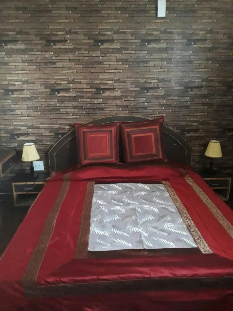Bed in Trimurti Pine Valley Resort