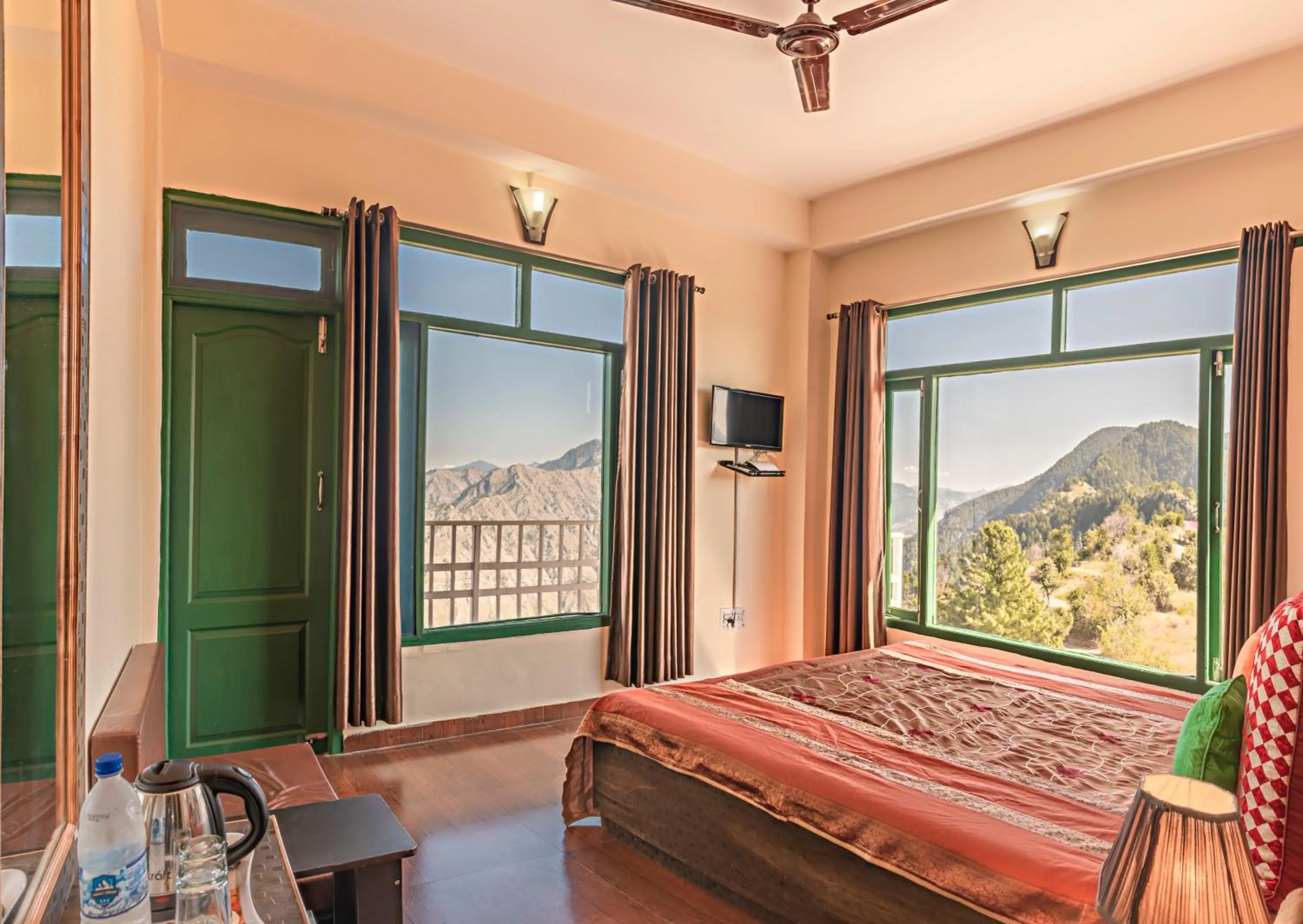 Bed in Trimurti Pine Valley Resort