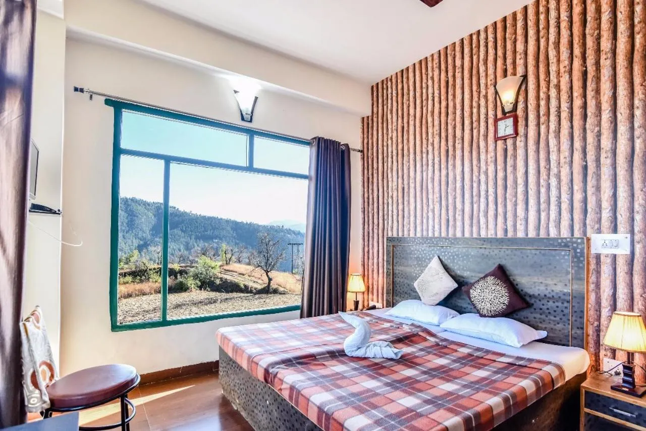 Bed in Trimurti Pine Valley Resort
