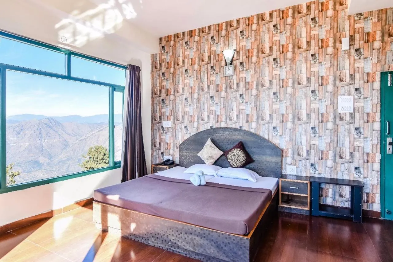 Bed in Trimurti Pine Valley Resort