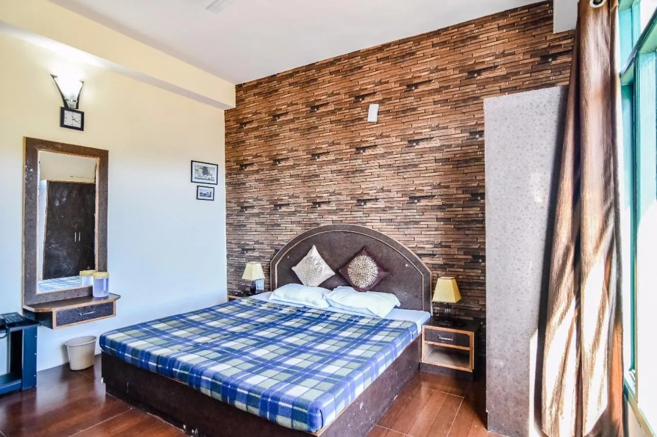 Bed in Trimurti Pine Valley Resort
