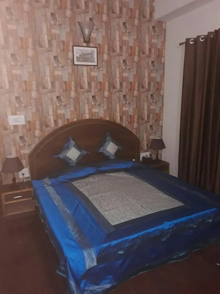 Bed in Trimurti Pine Valley Resort