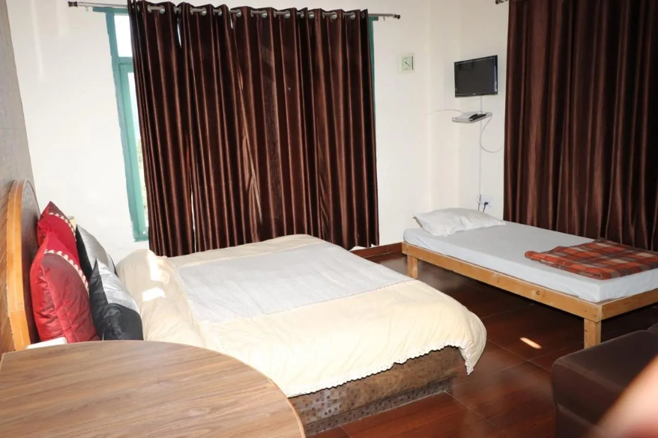Bed in Trimurti Pine Valley Resort
