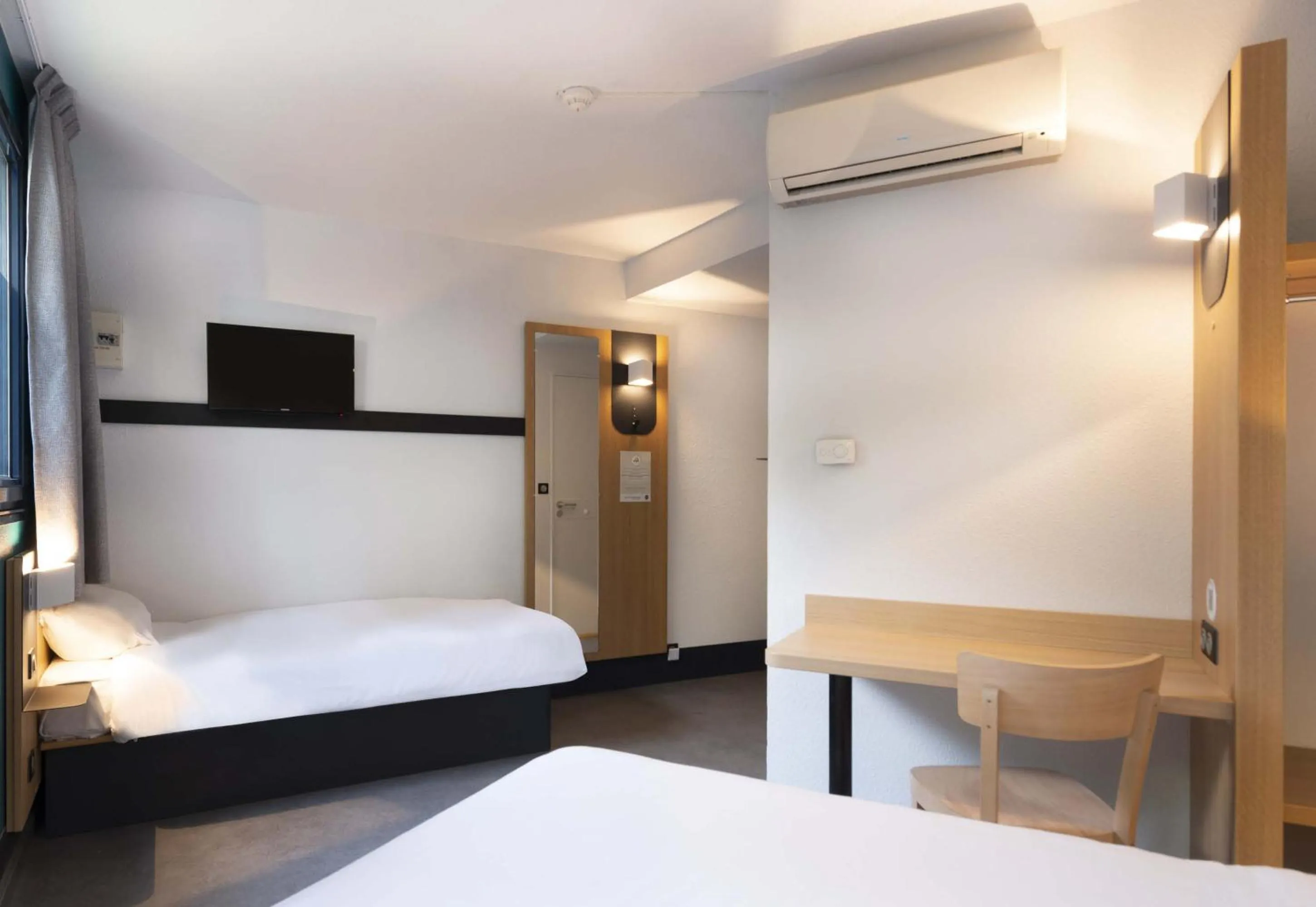 Bedroom, Bed in B&B HOTEL Cholet Sud