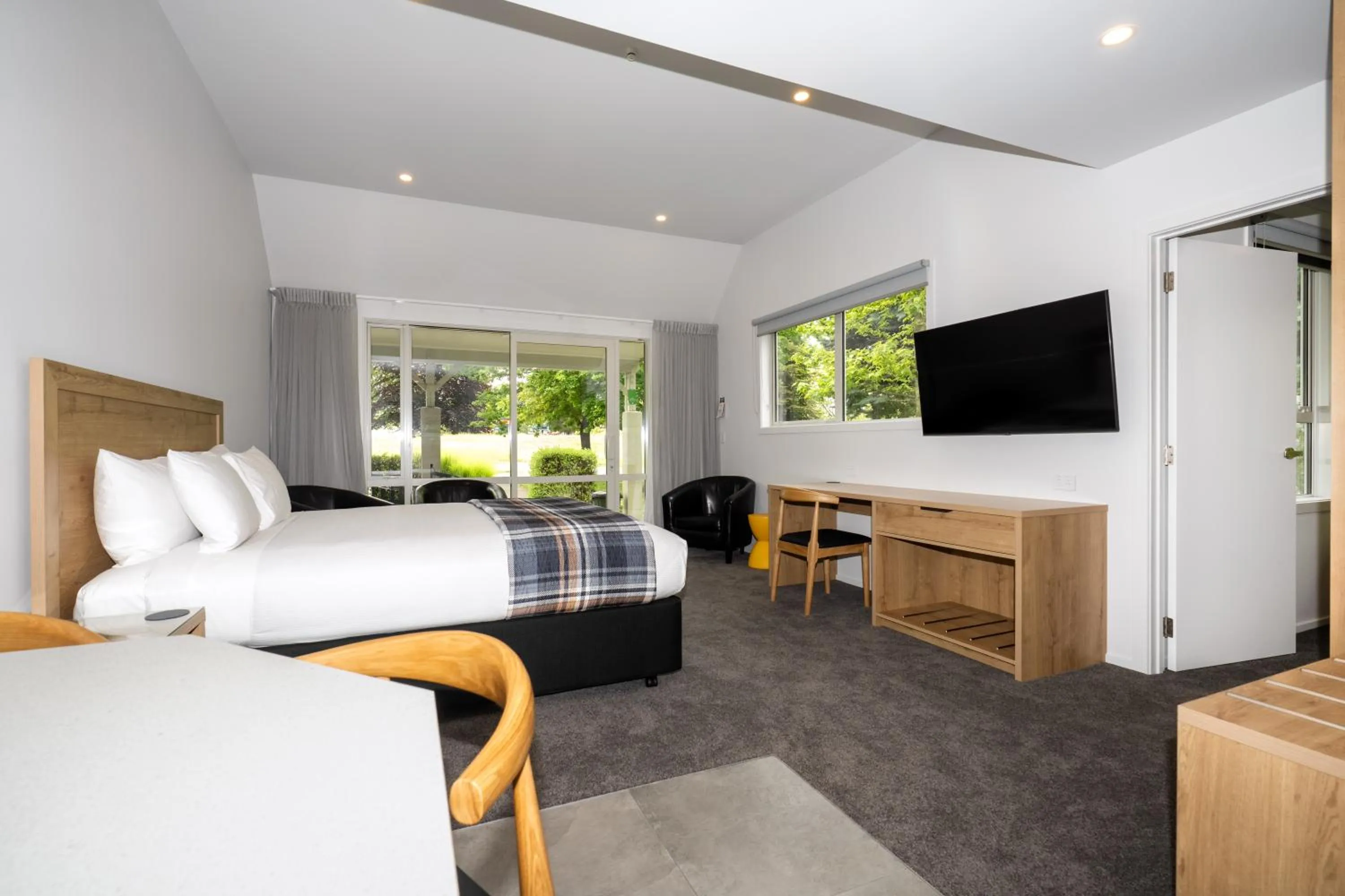 Bed in Colonial Manor Motel