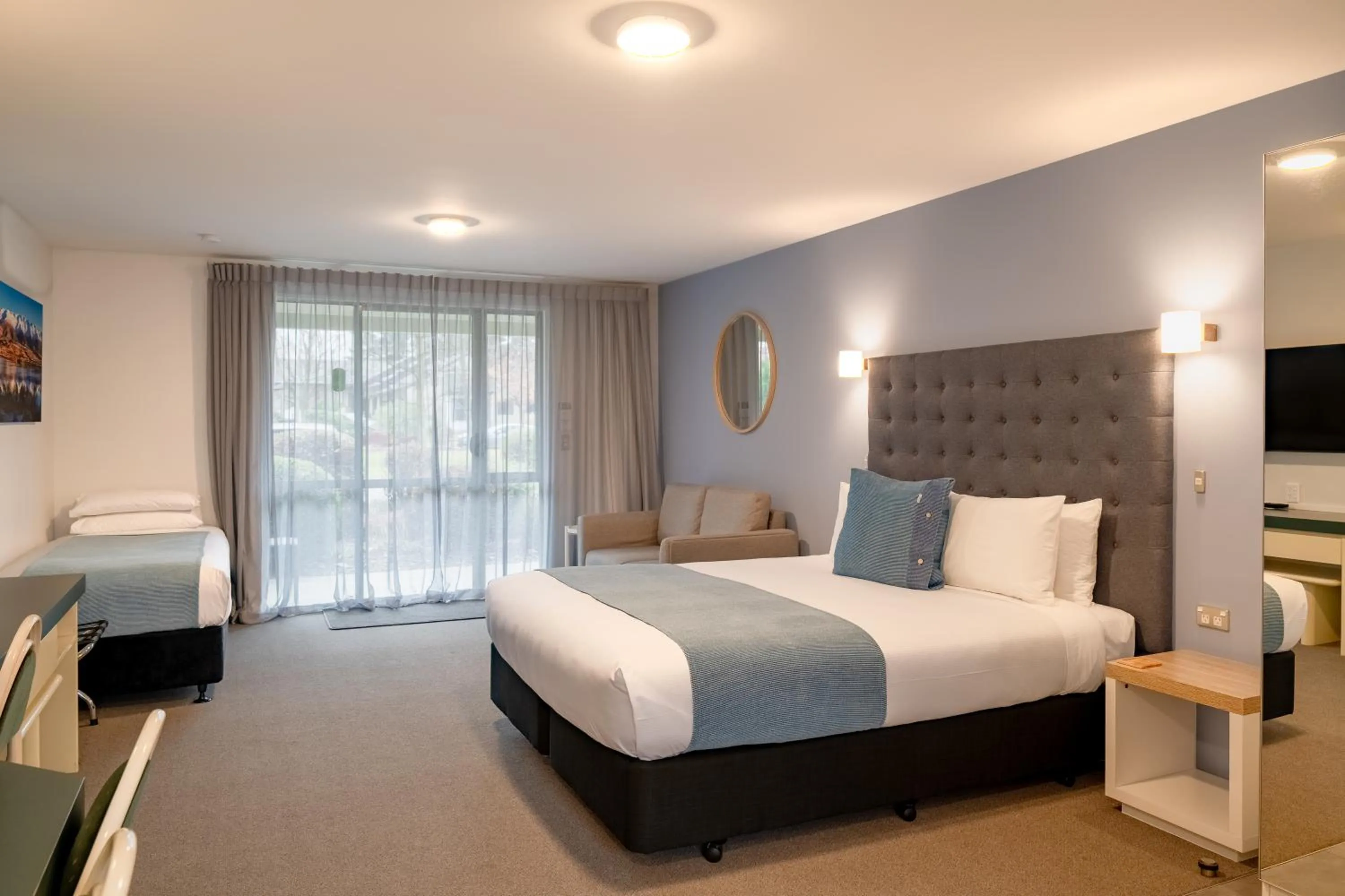 Bed in Colonial Manor Motel