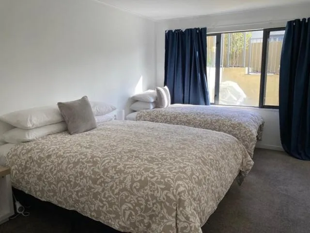 Bed in Colonial Manor Motel