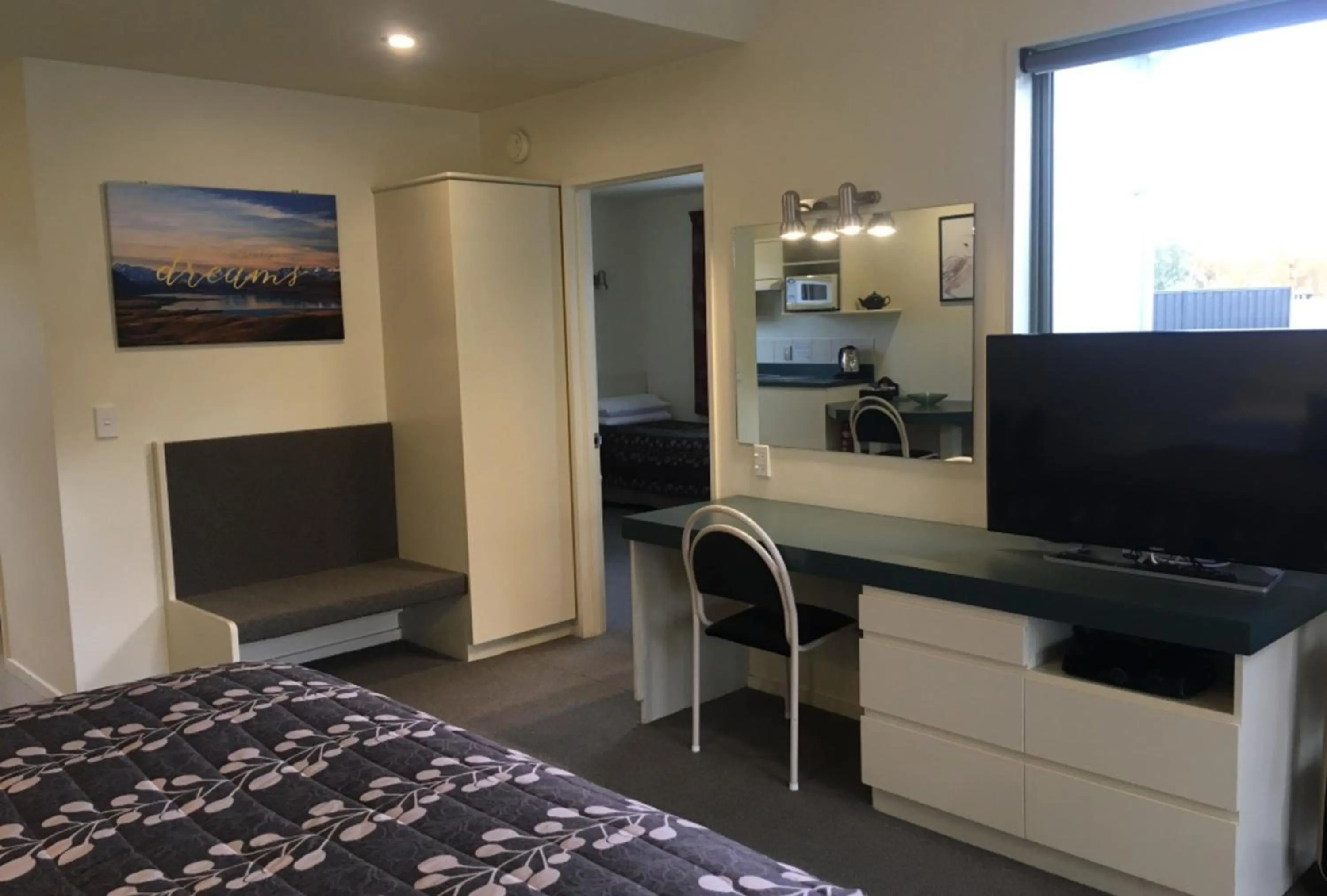 Bed in Colonial Manor Motel